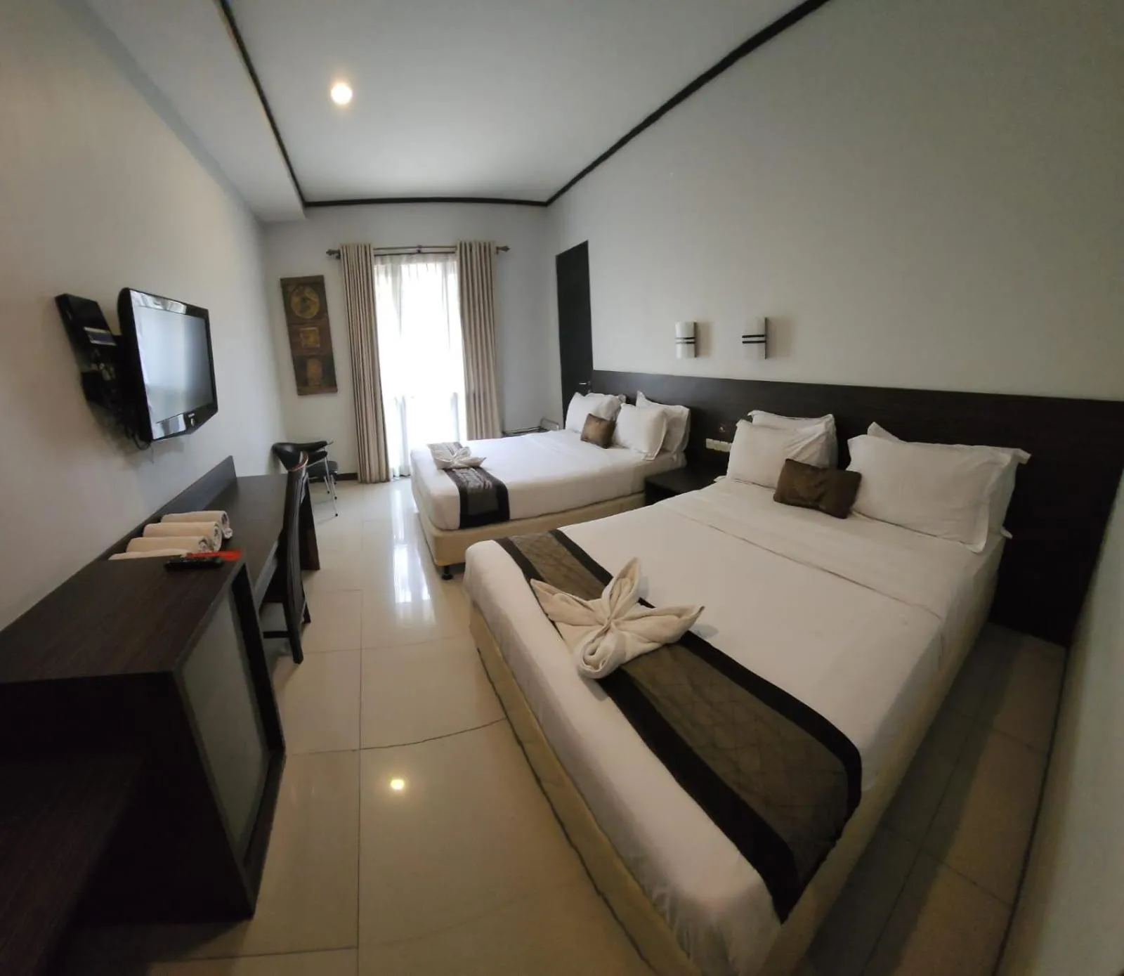 Communal lounge/ TV room, Bed in Summer Hills Hotel & Villas Bandung