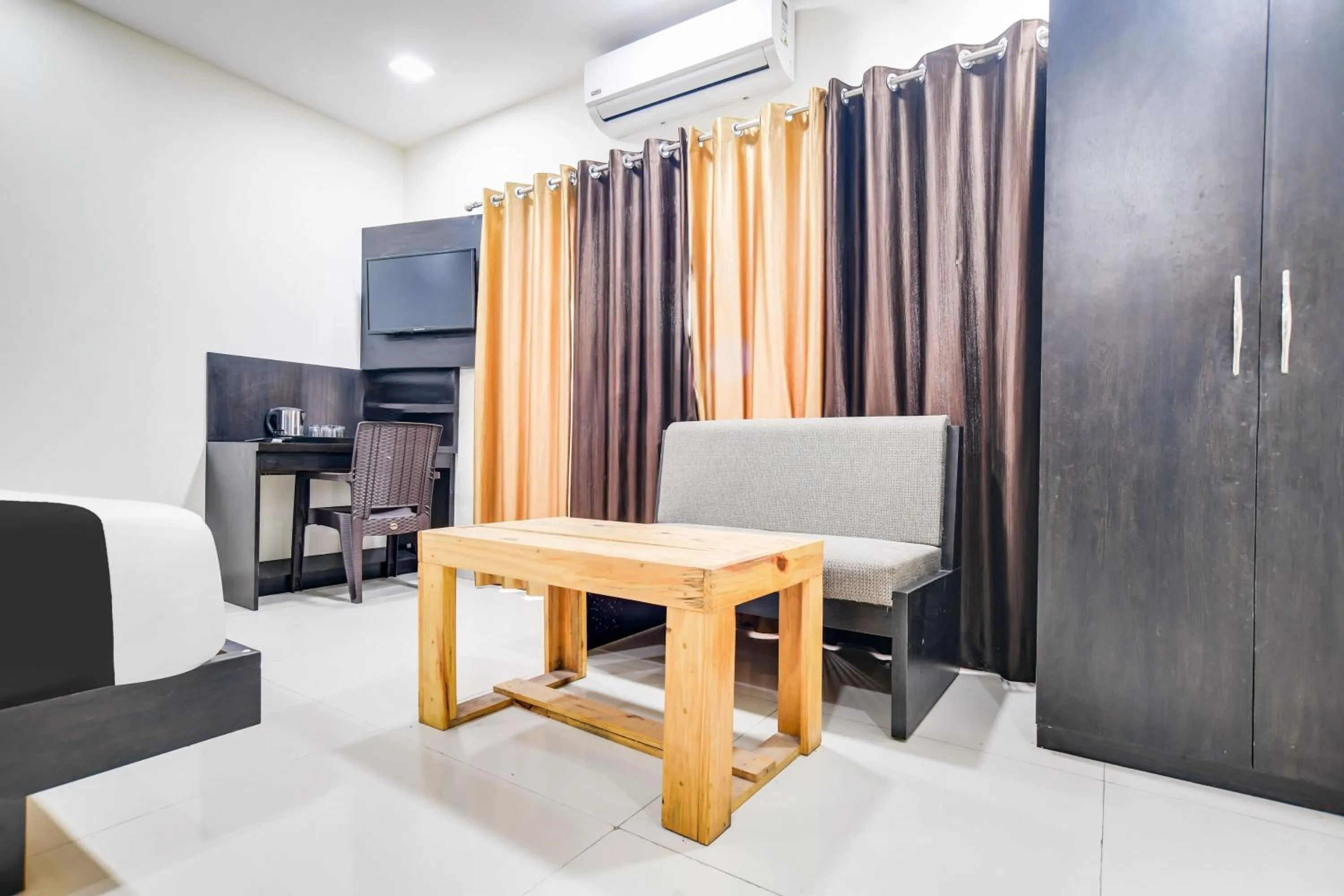 Bedroom in Super Collection O Indore Near Omax City 1