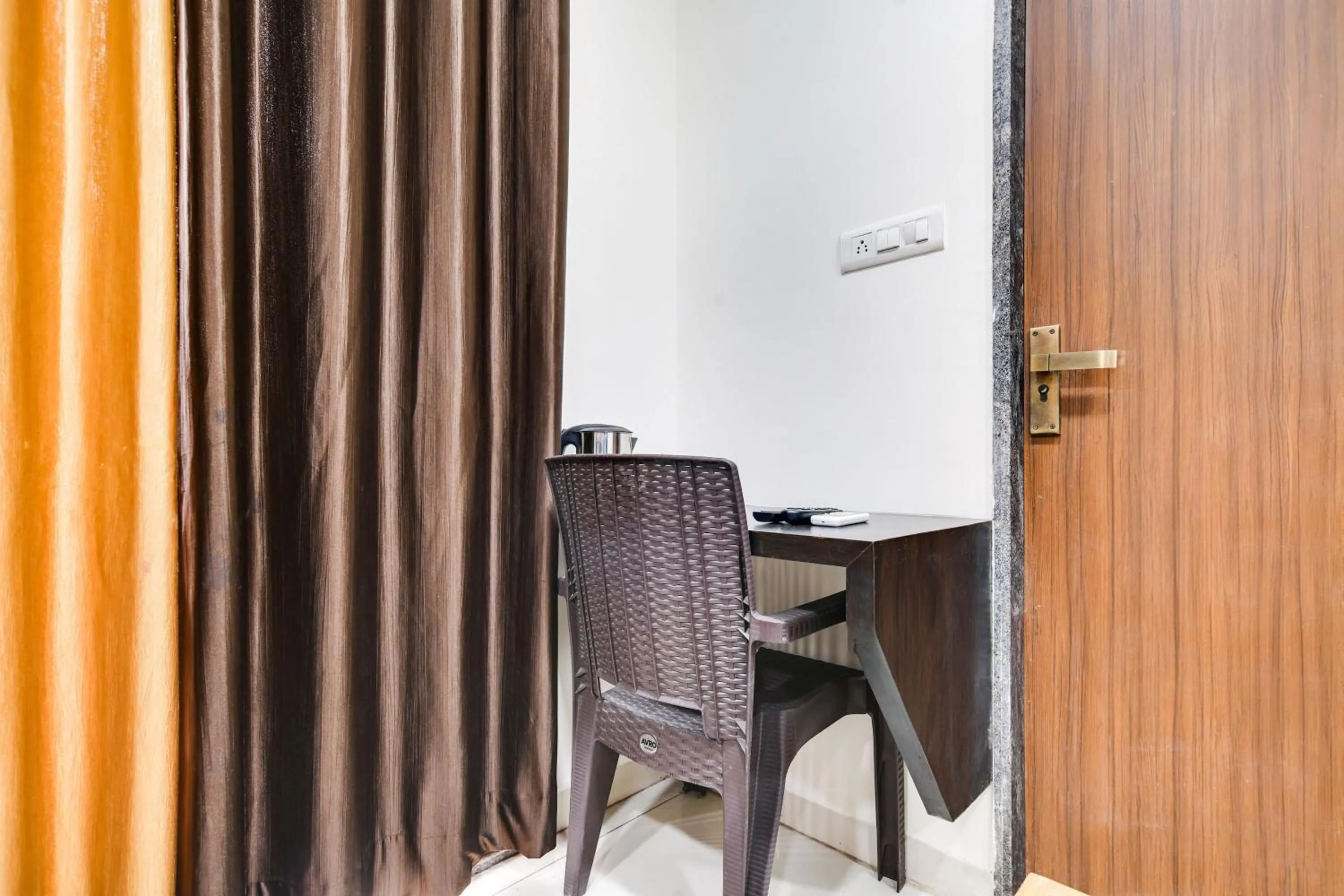 Bedroom in Super Collection O Indore Near Omax City 1