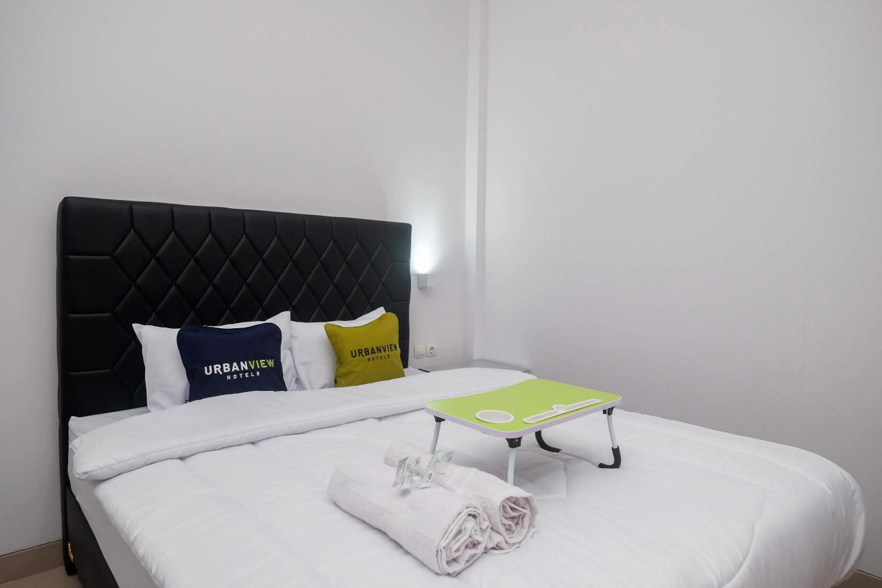 Bed in Urbanview Syariah Loji Arum Stasiun Klaten by RedDoorz