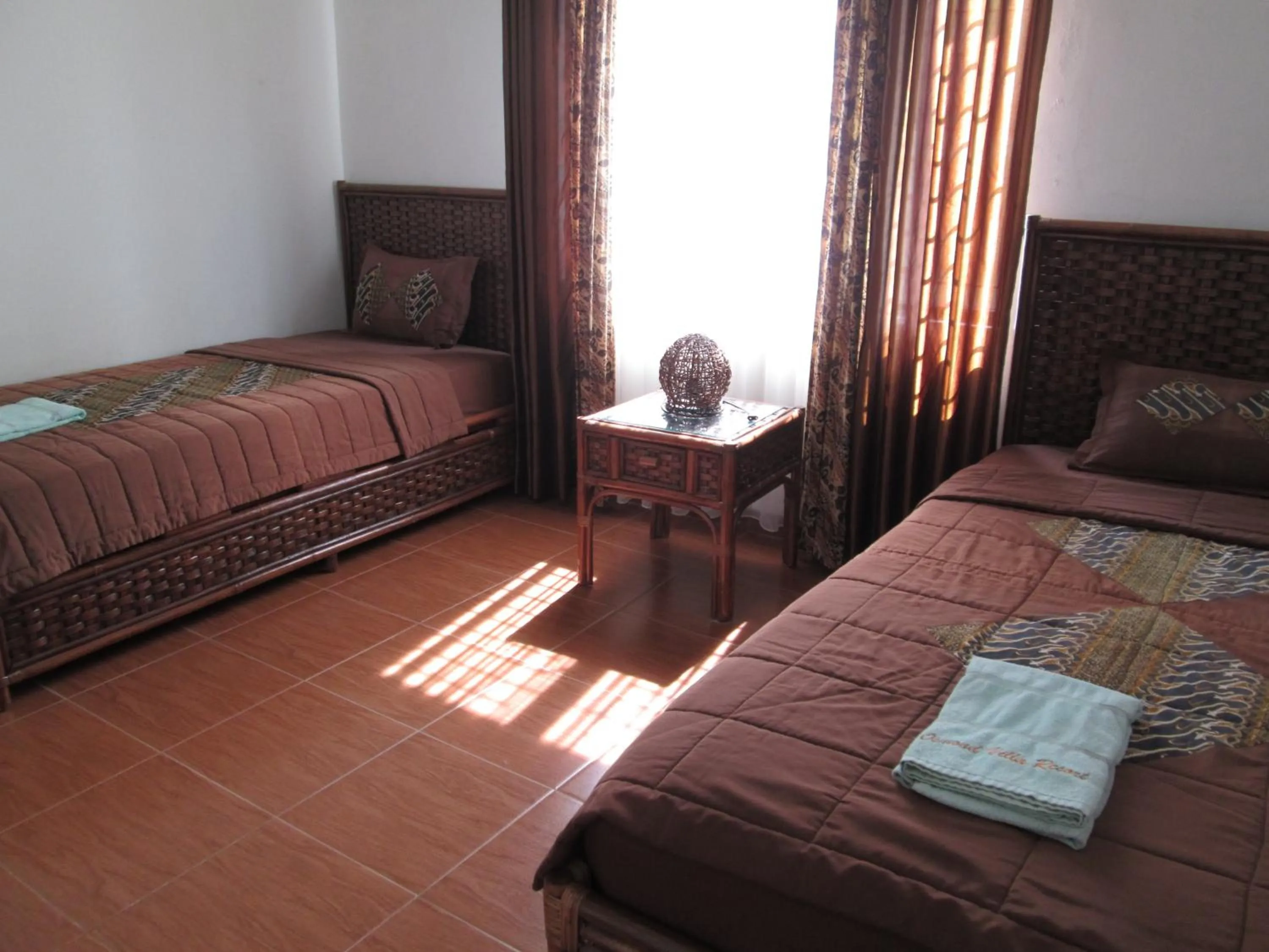 Bed in Osmond Villa Resort