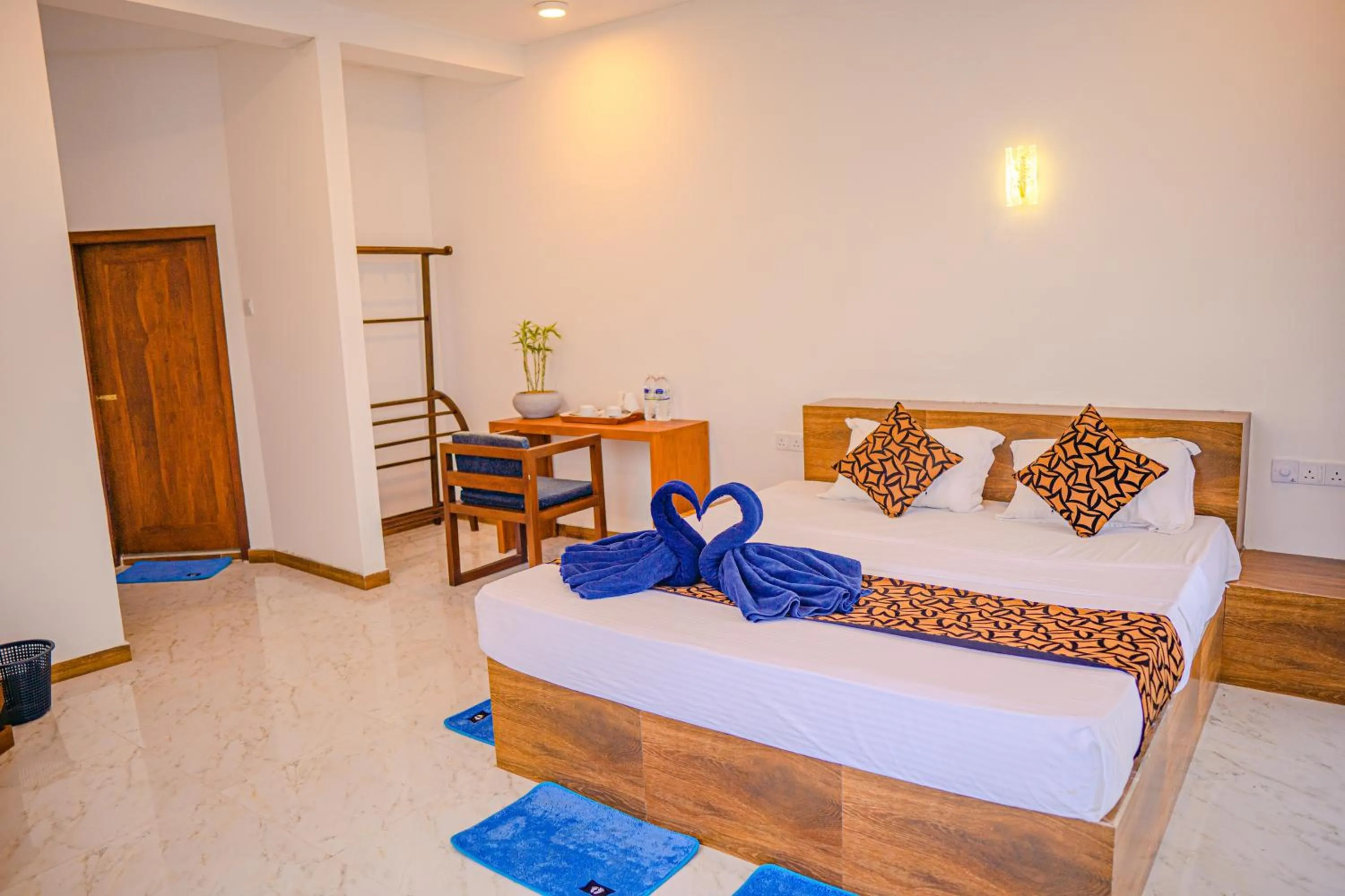 Bed in Cool Beach Hotel