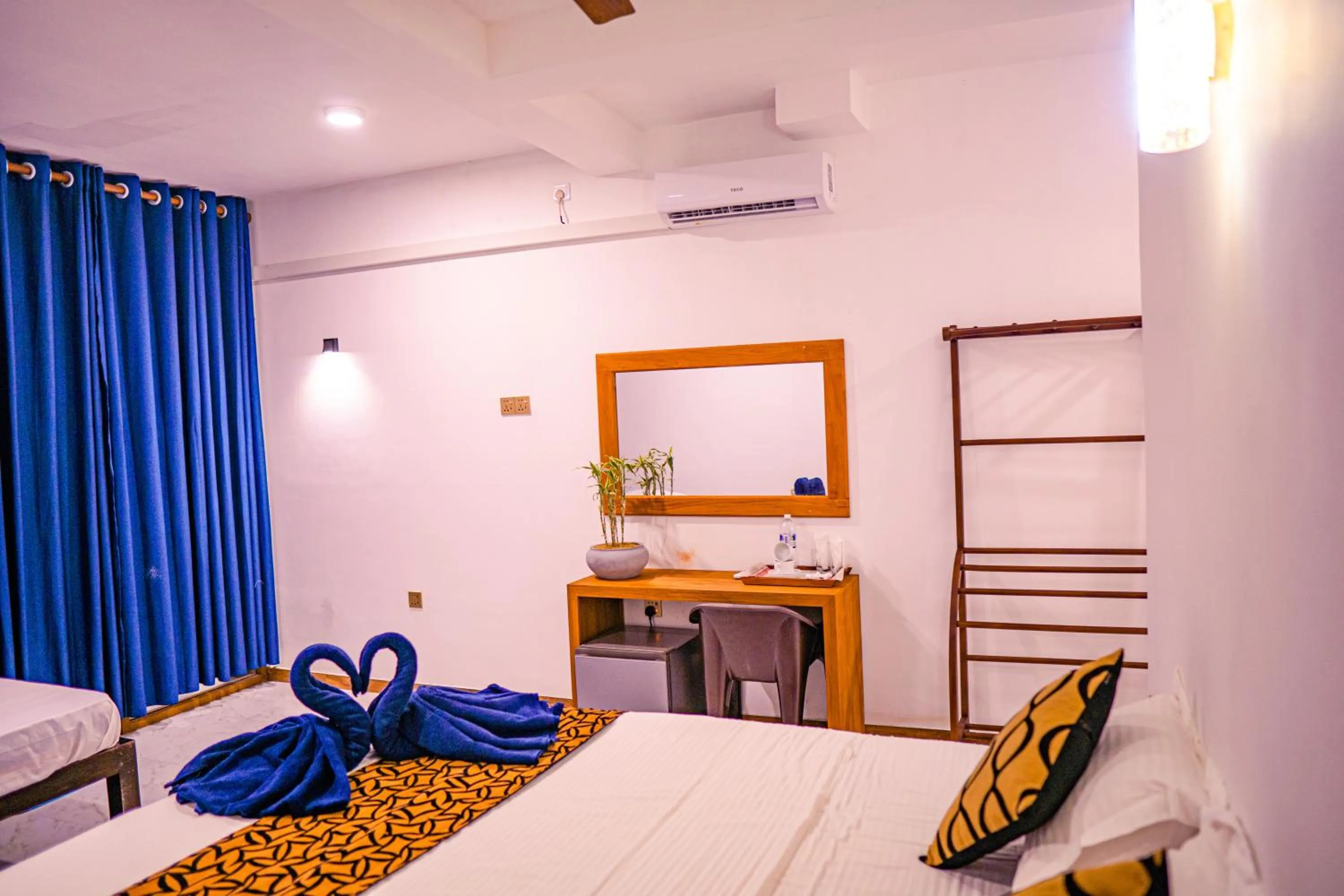 Bed in Cool Beach Hotel