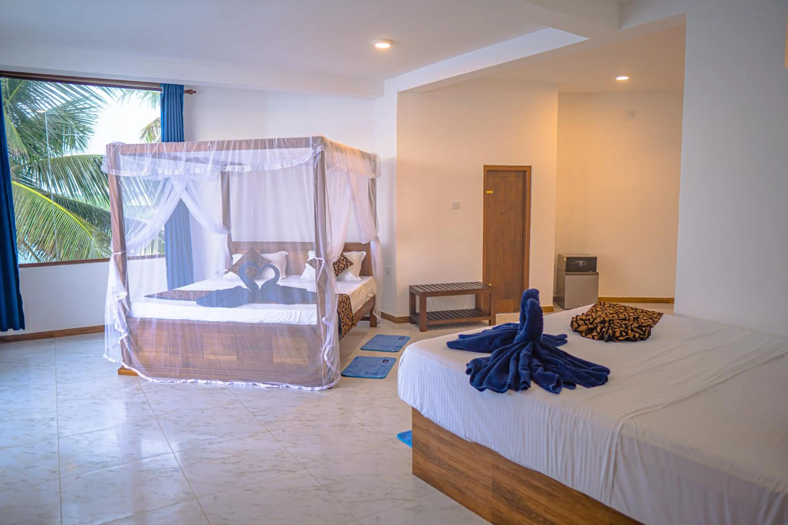 Bed in Cool Beach Hotel