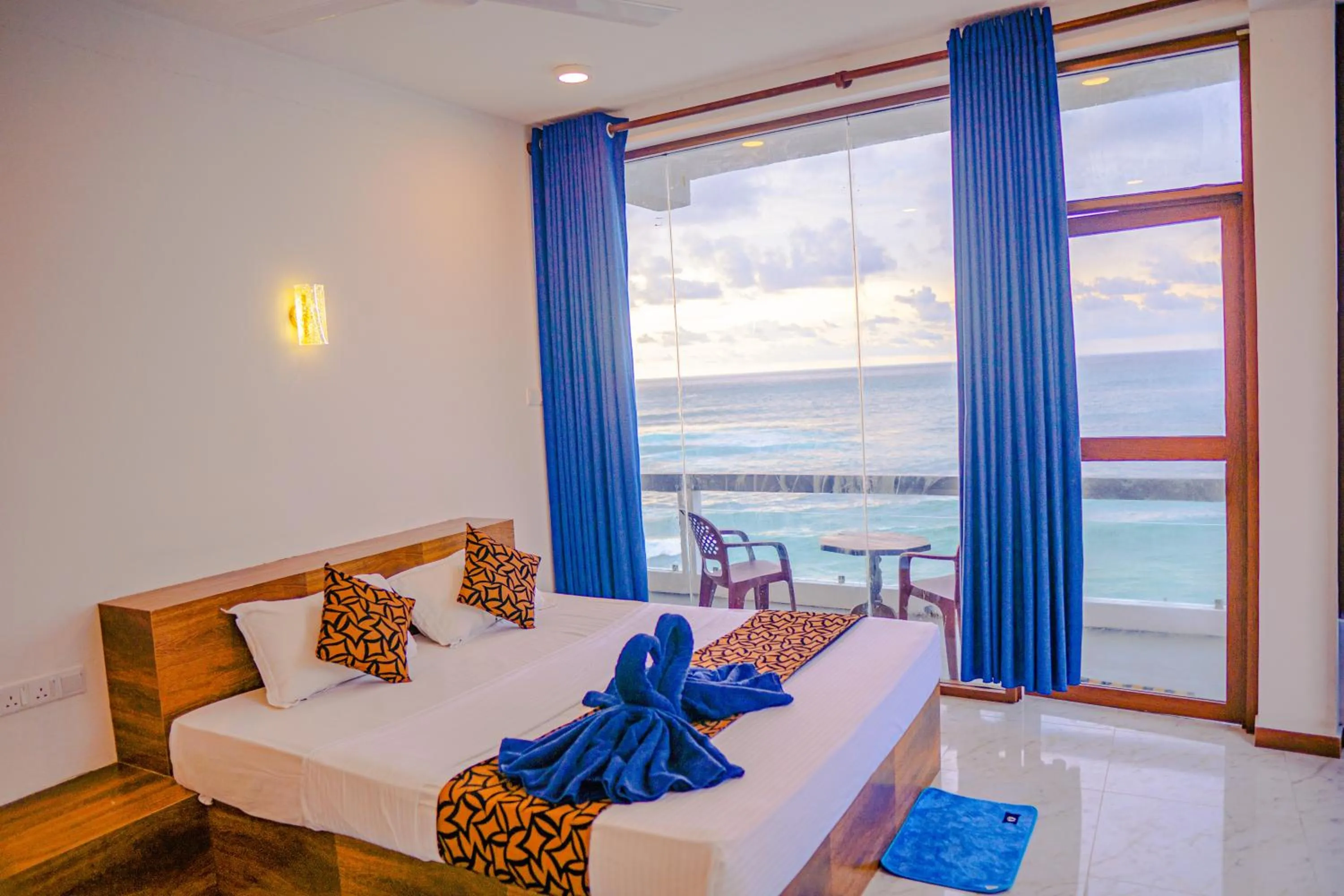 Bed in Cool Beach Hotel