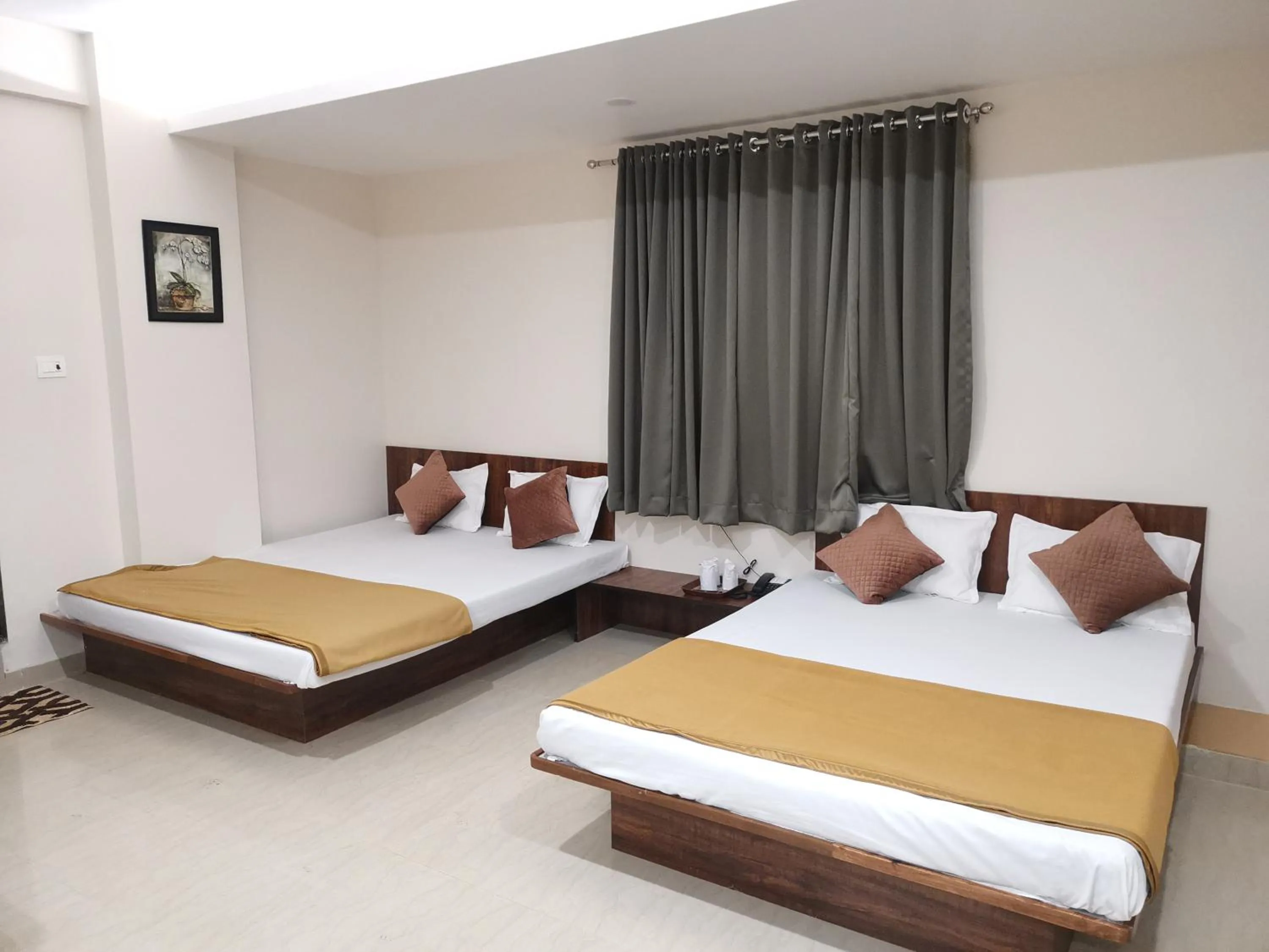 Bed in Hotel Darshan Grand