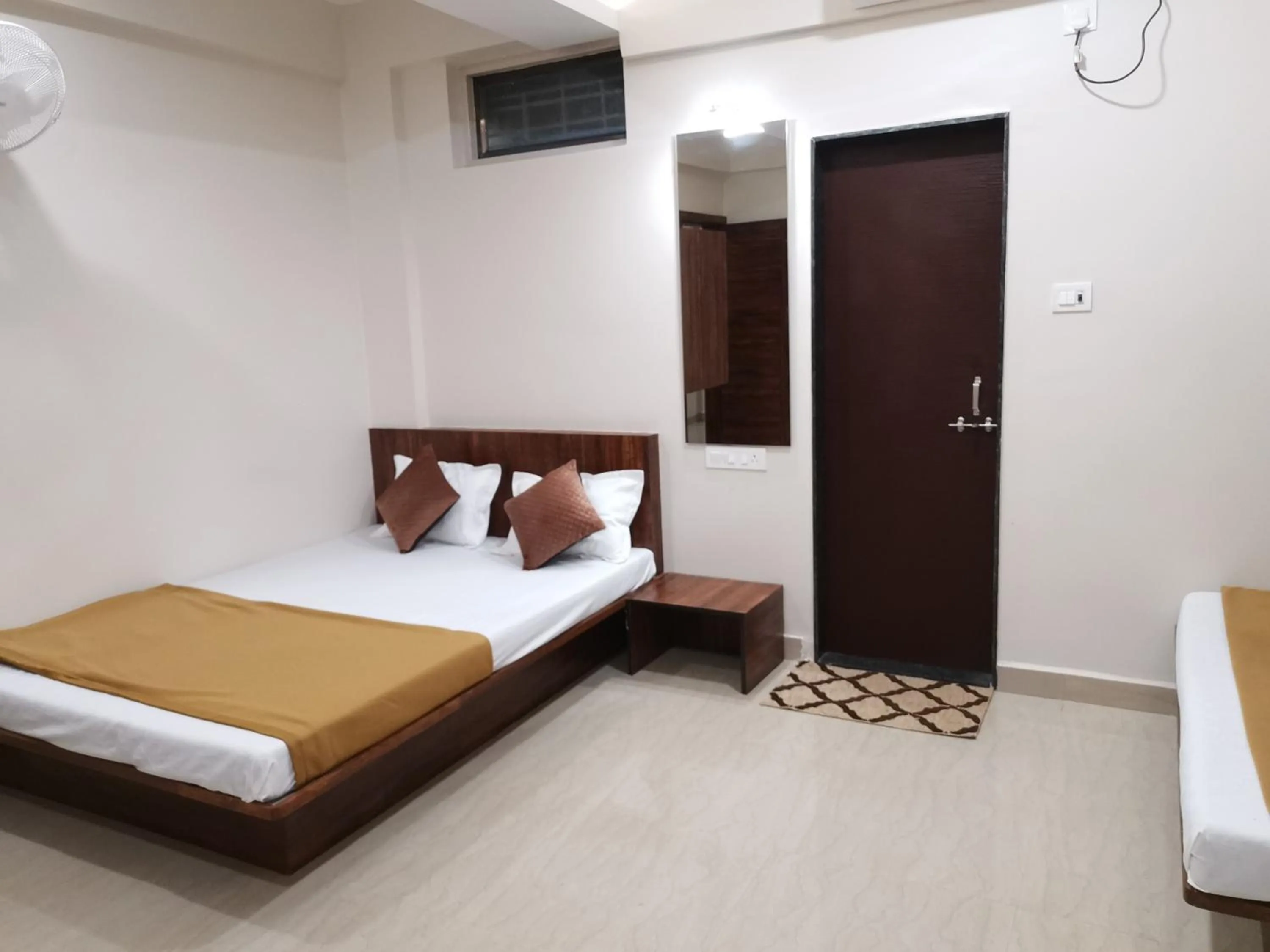 Bed in Hotel Darshan Grand