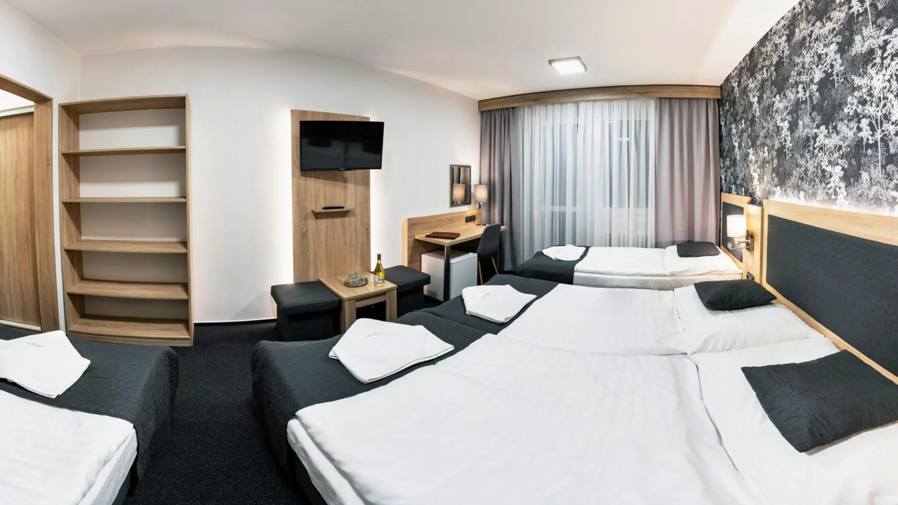 Comfort Quadruple Room in Hotel Kamzík *** Comfort Quadruple Room in Hotel Kamzík ***