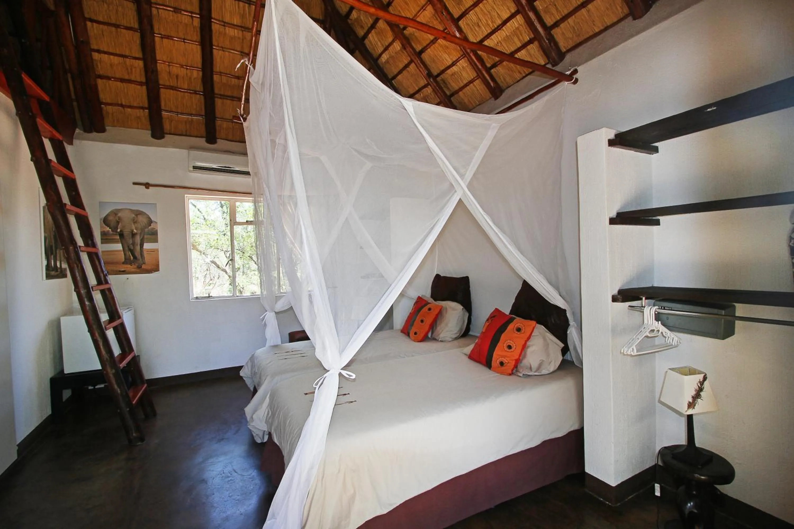 Bed in Normann Safari Bush Lodge