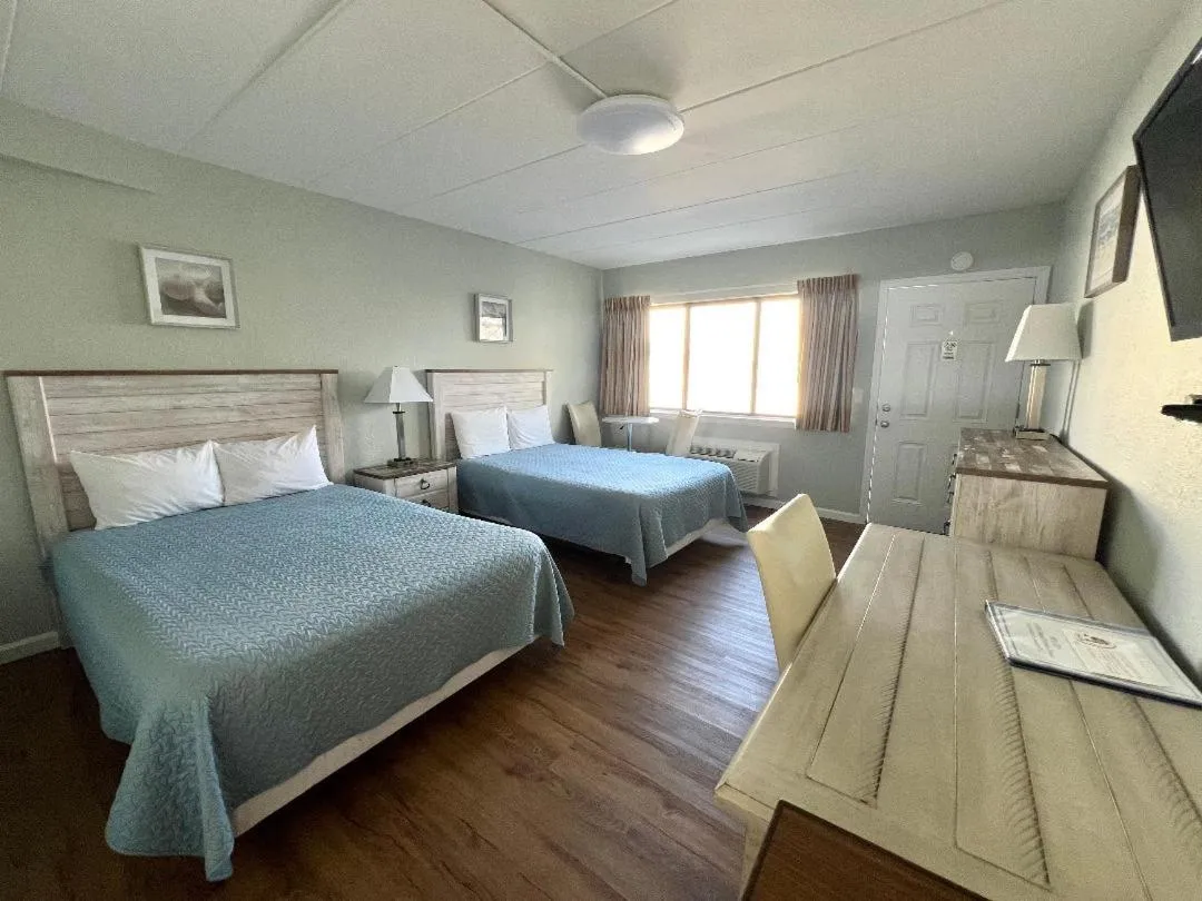 Photo of the whole room, Bed in Sand Pebble Motor Lodge