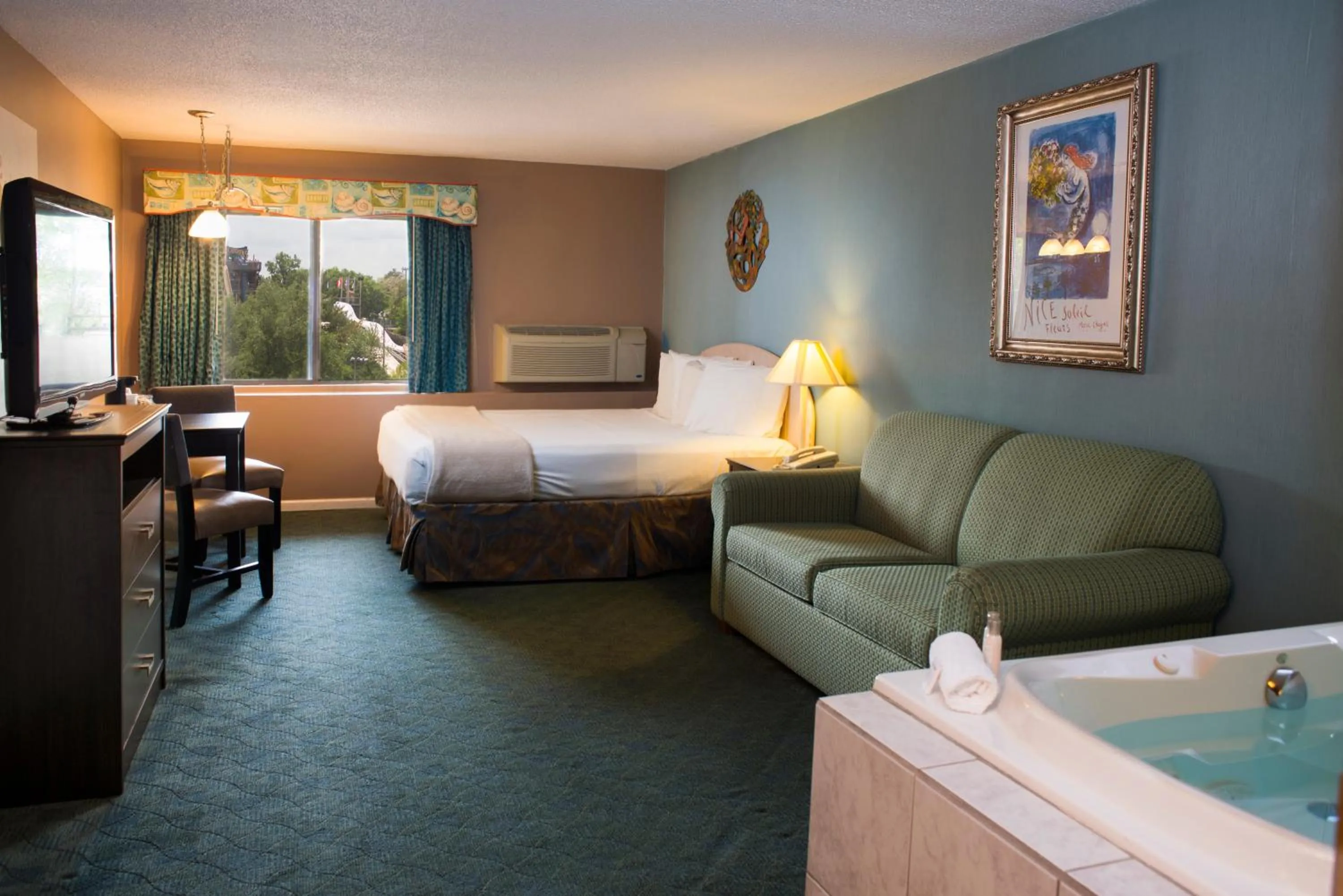 Bedroom in Atlantis Family Waterpark Hotel, an Ascend Collection Hotel