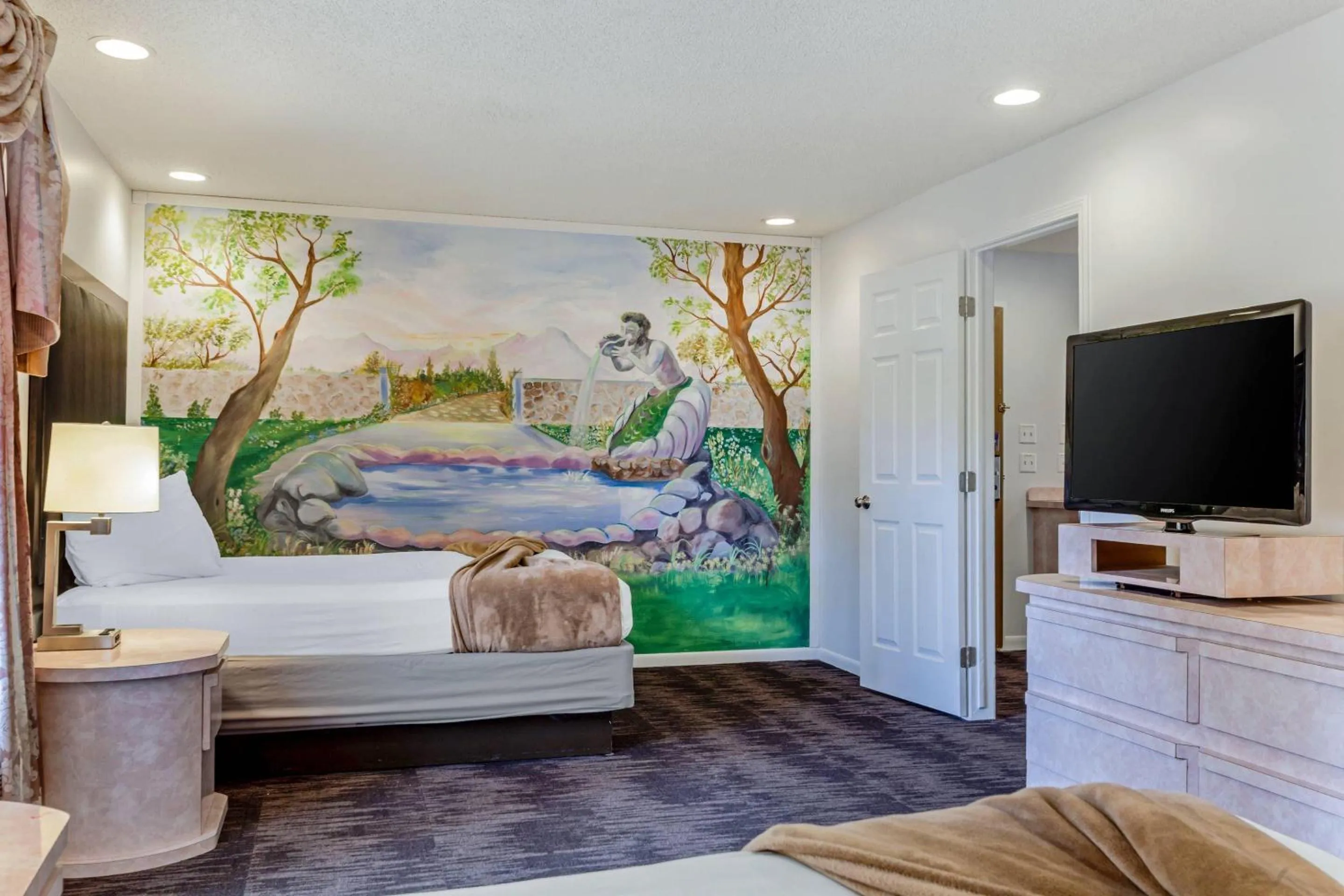 Bedroom in Atlantis Family Waterpark Hotel, an Ascend Collection Hotel