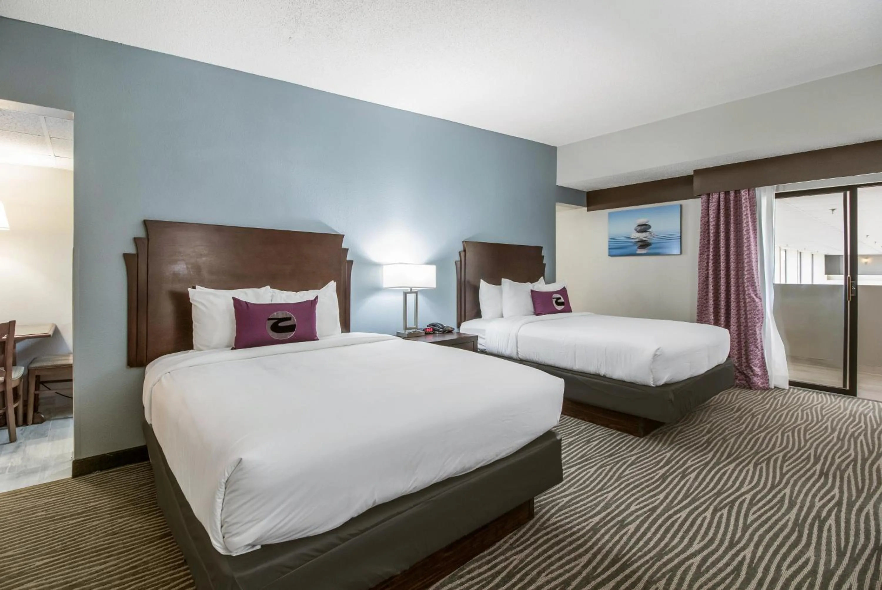 Bed in Clarion Hotel Jackson Northwest