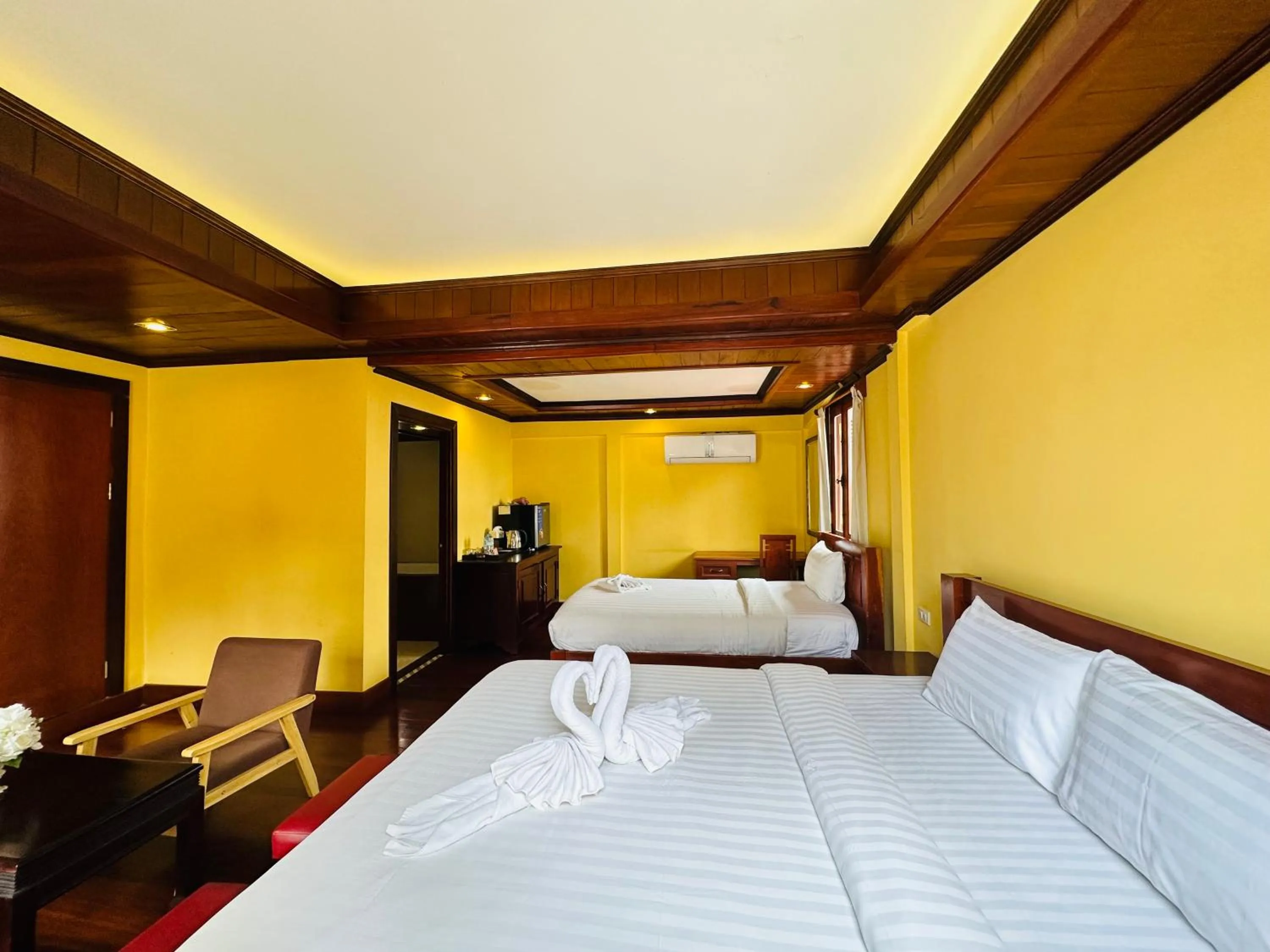 Bed in Villa Phonethip Mekong Riverside