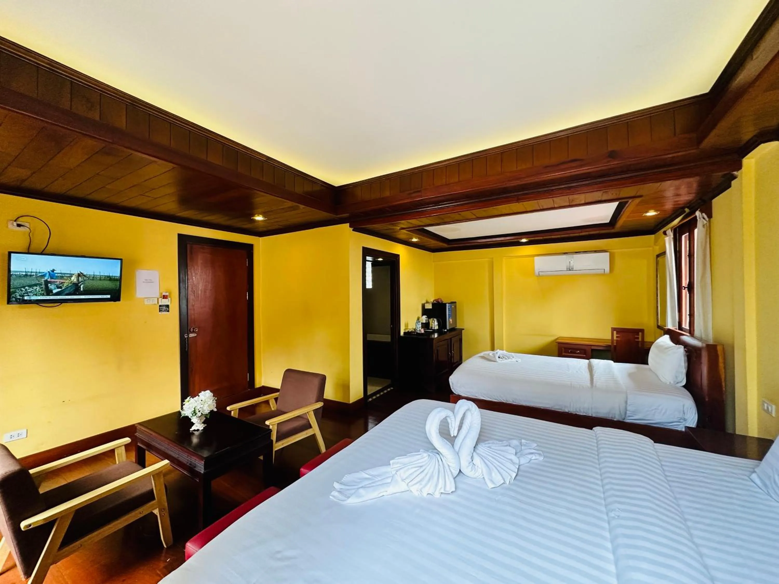 Bed in Villa Phonethip Mekong Riverside