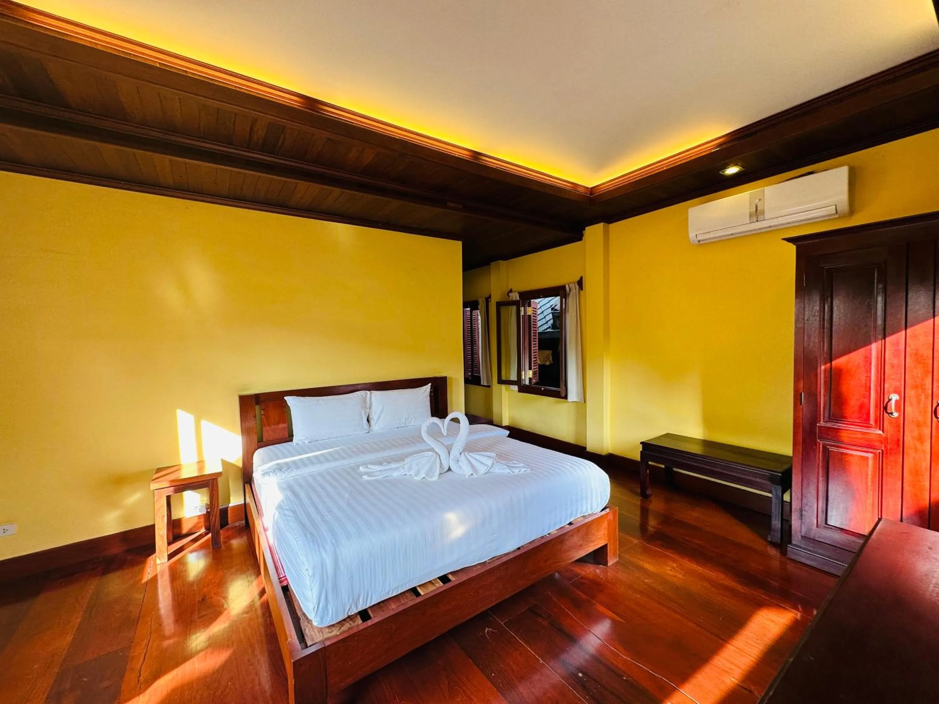 Communal lounge/ TV room, Bed in Villa Phonethip Mekong Riverside