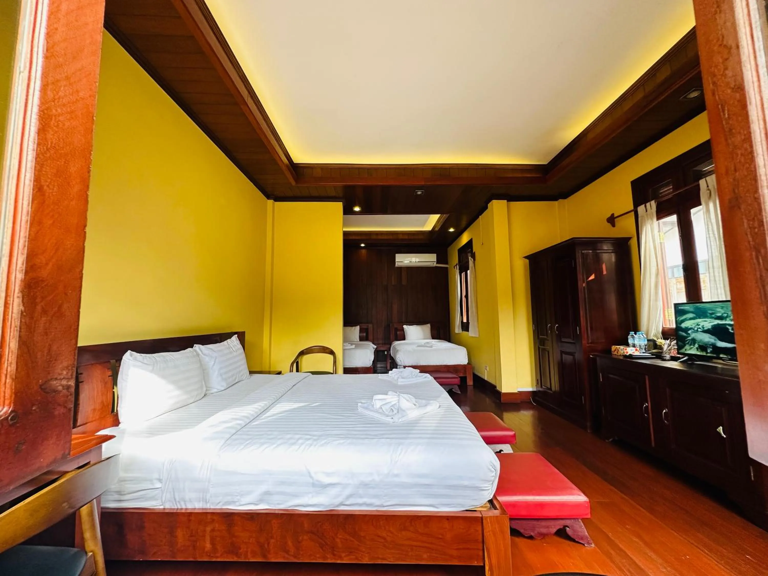 Bed in Villa Phonethip Mekong Riverside