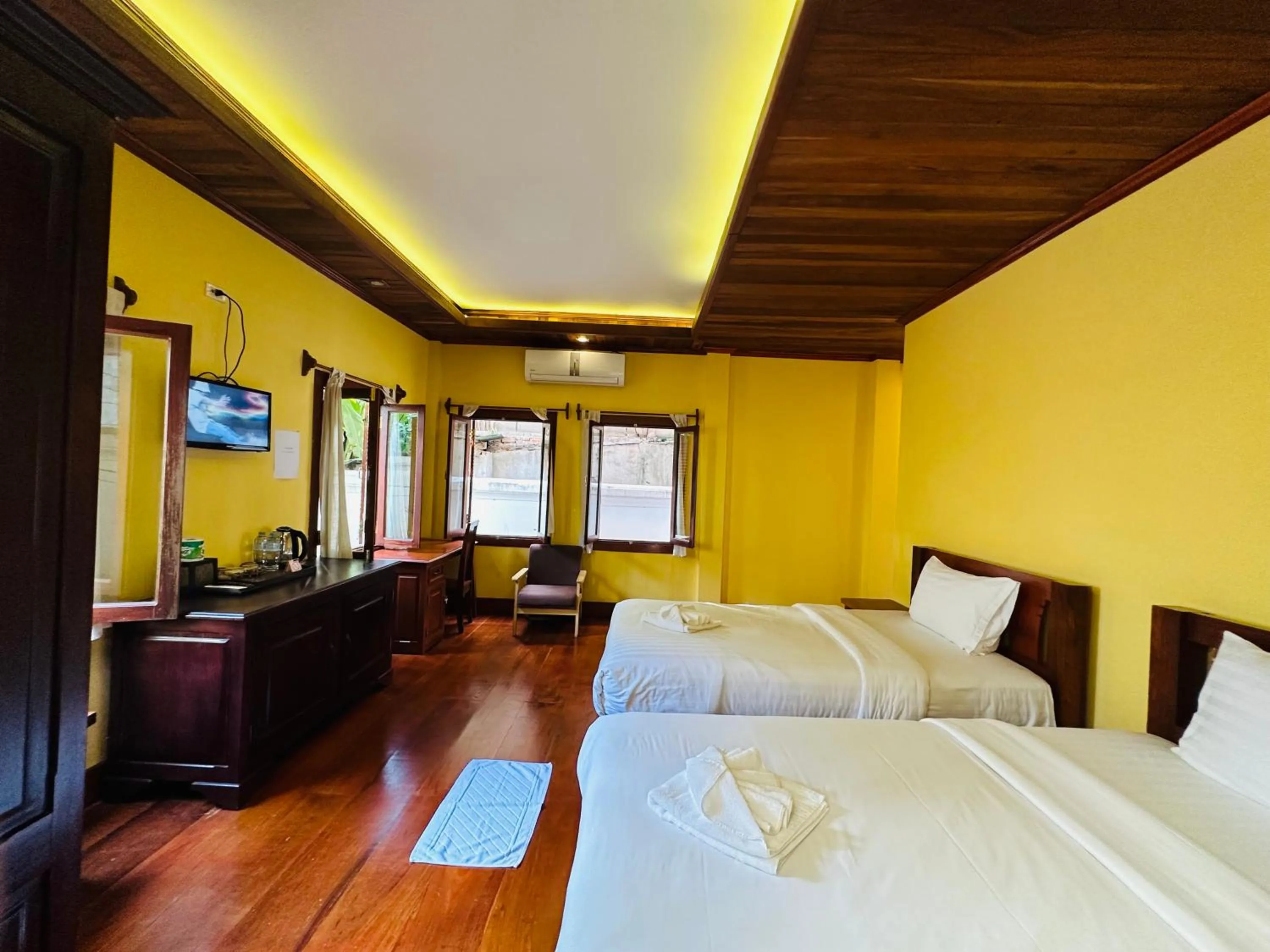 Bed in Villa Phonethip Mekong Riverside