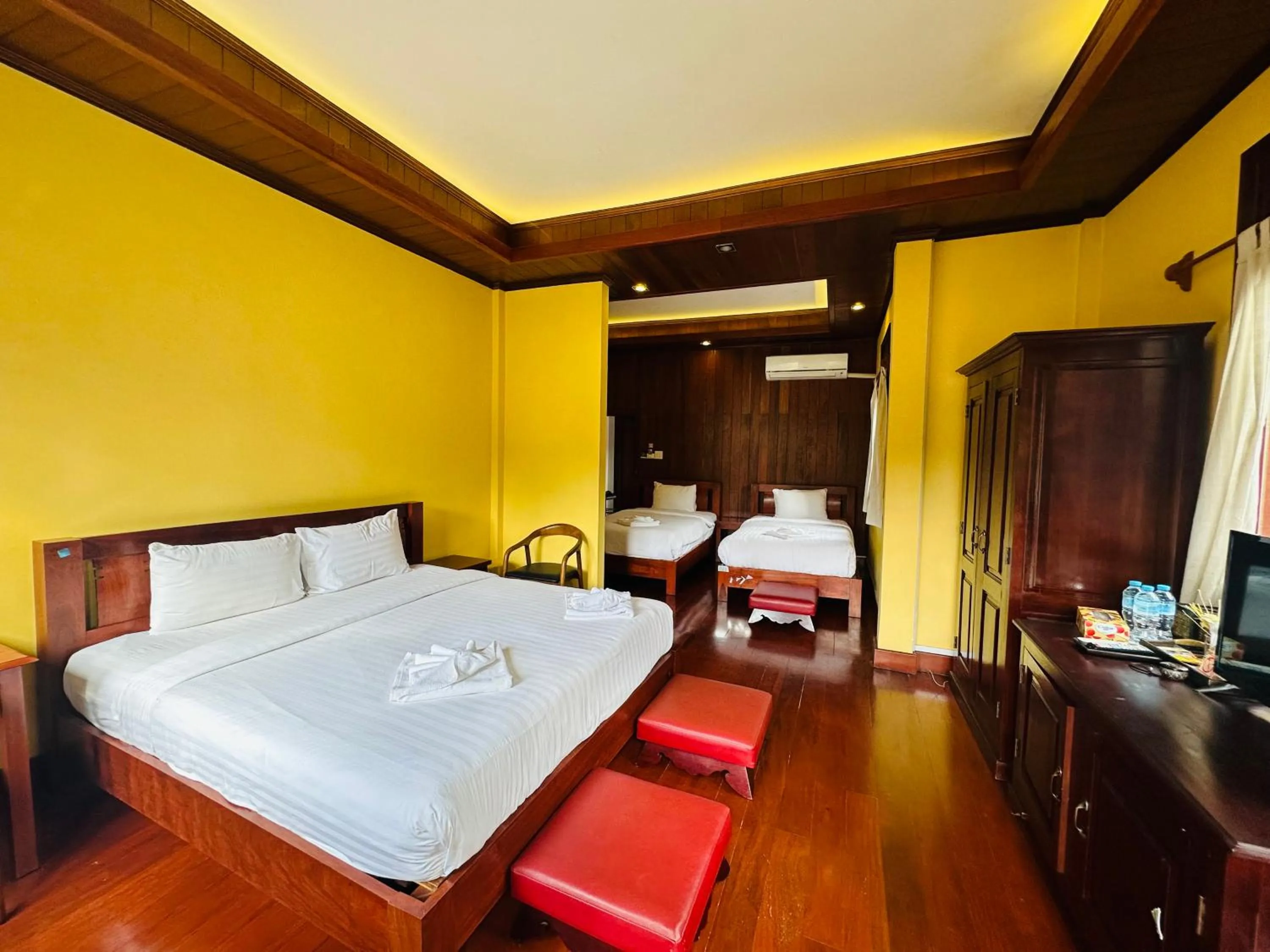 Bed in Villa Phonethip Mekong Riverside