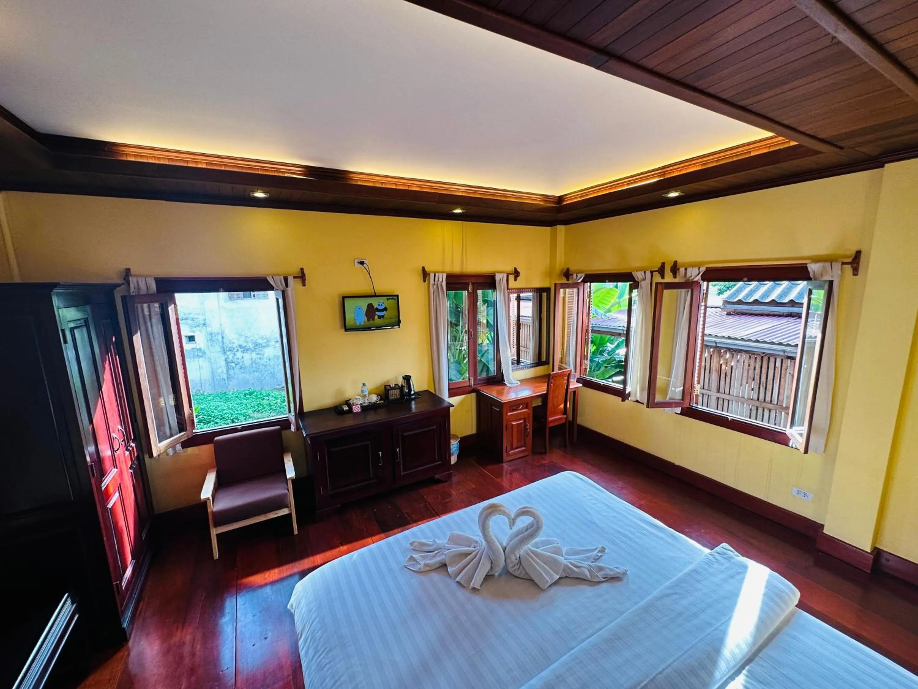 Bed in Villa Phonethip Mekong Riverside