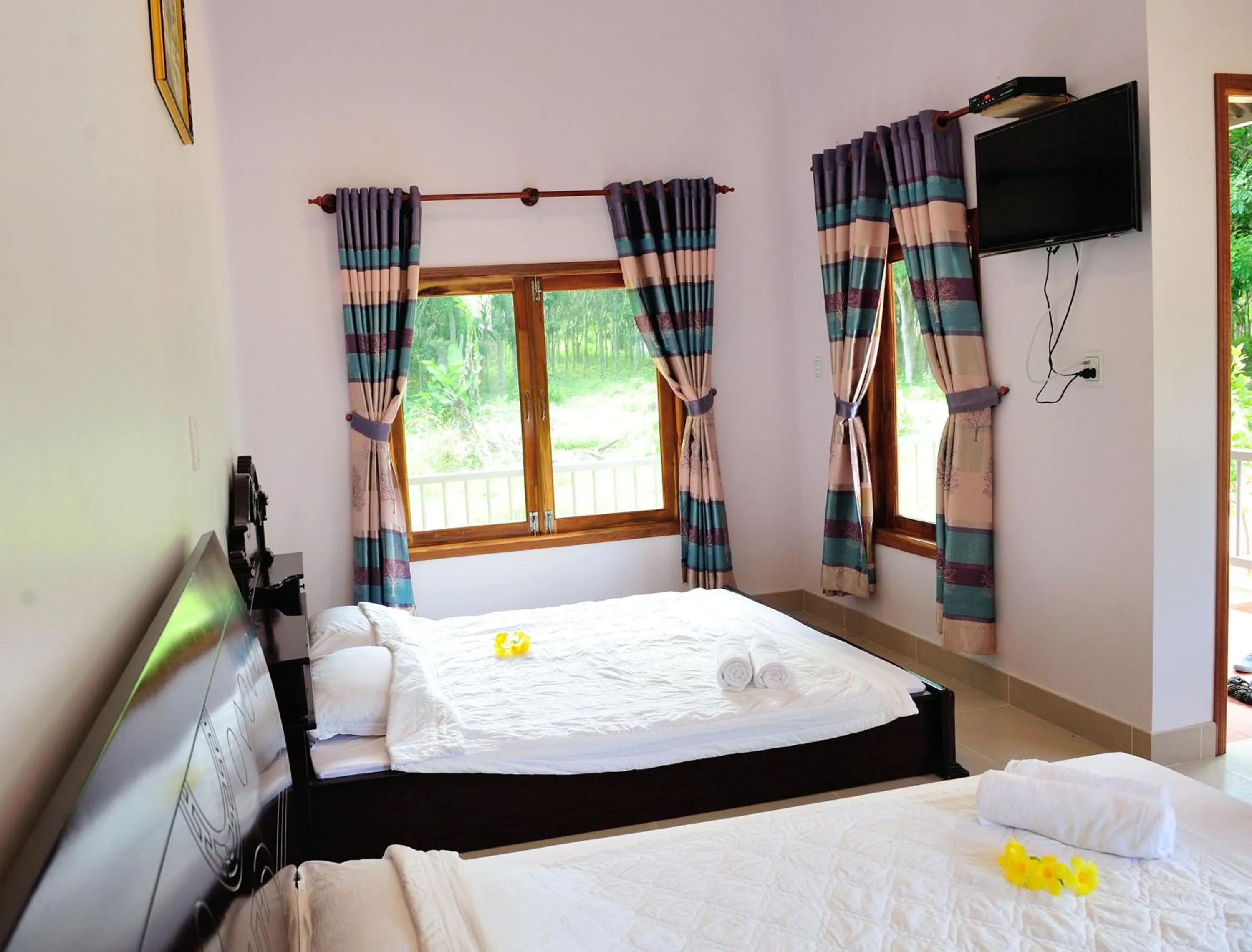 Bed in Tang Thanh Phat Resort