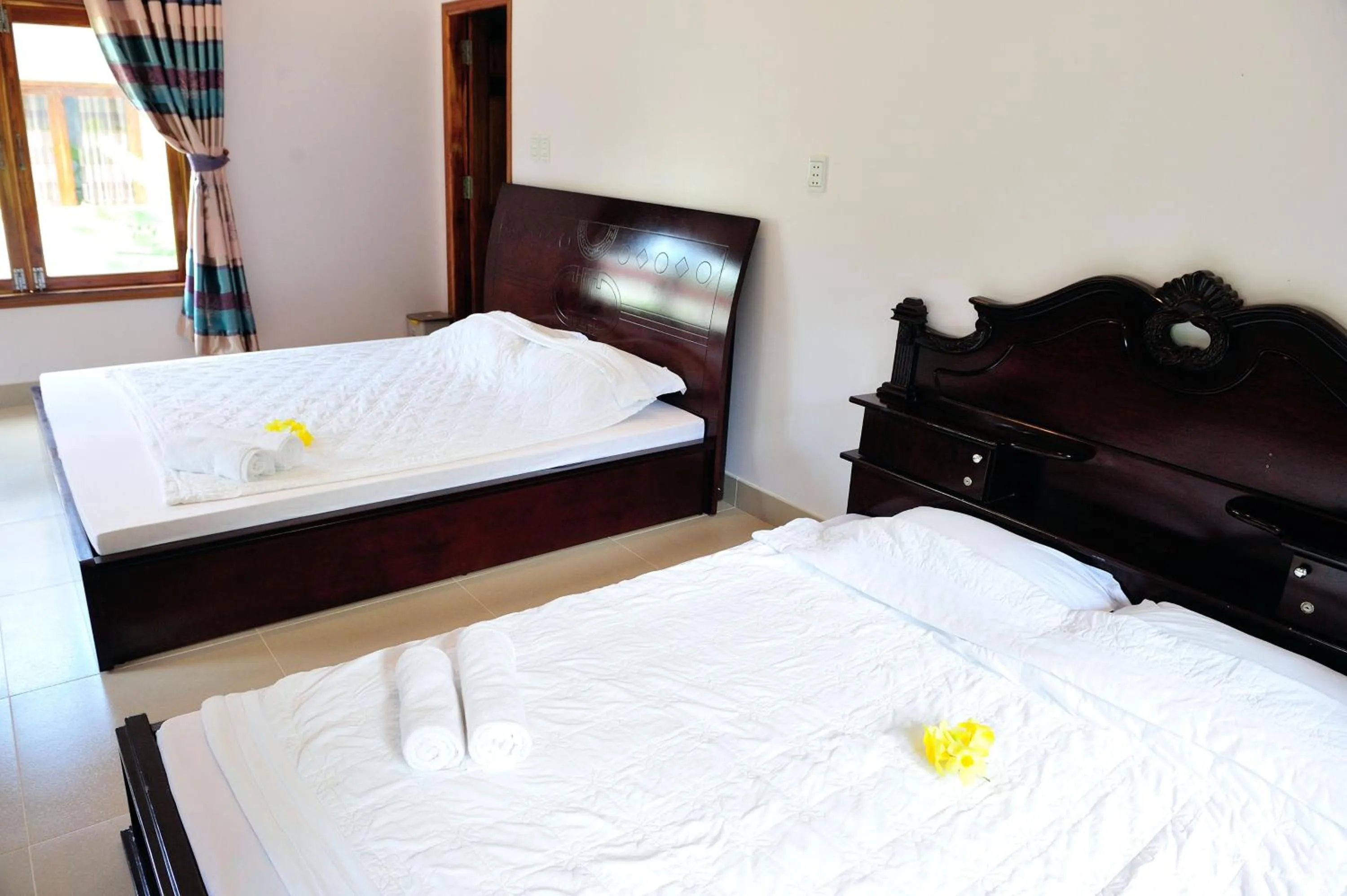 Bed in Tang Thanh Phat Resort