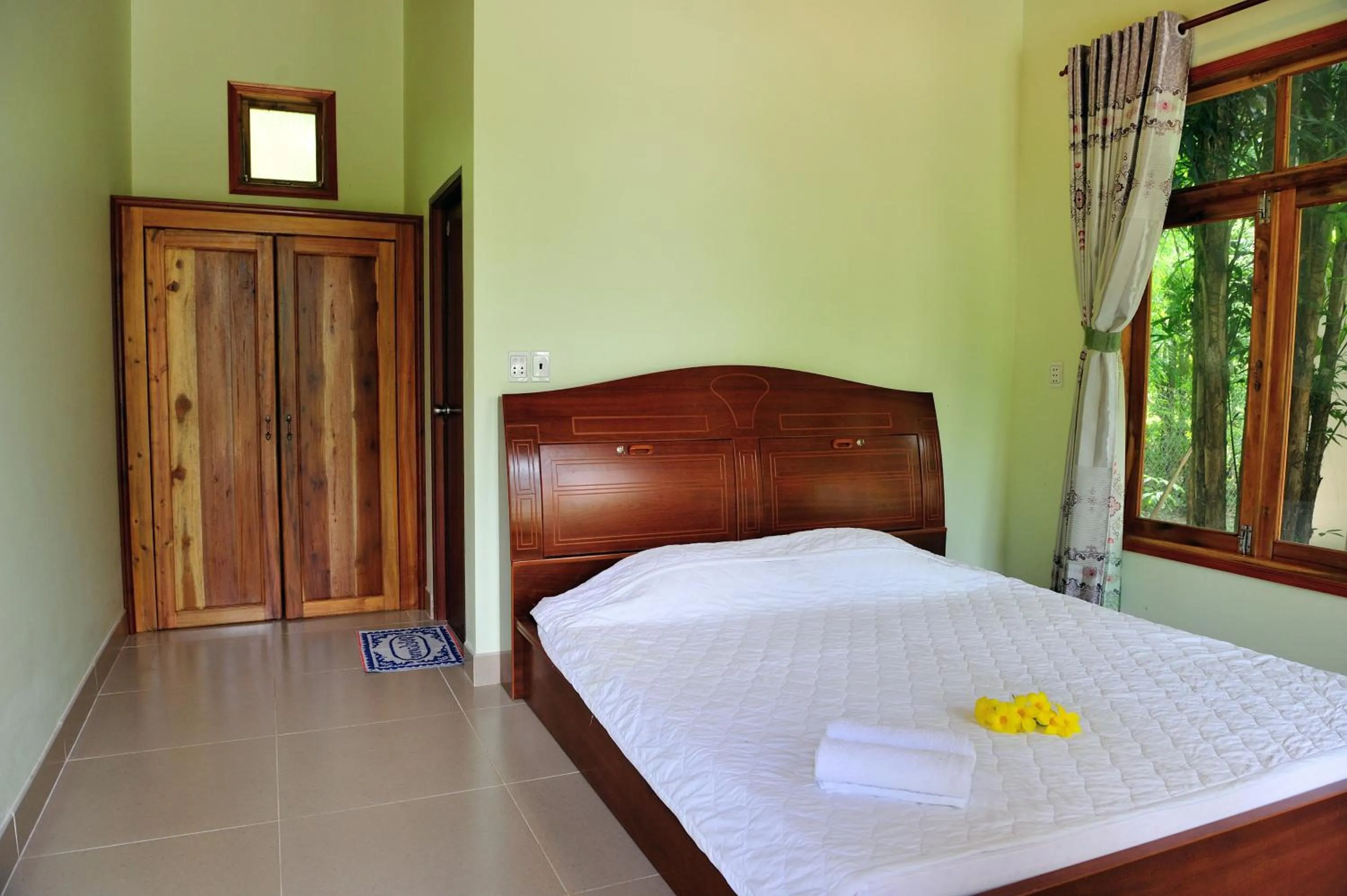 Bed in Tang Thanh Phat Resort