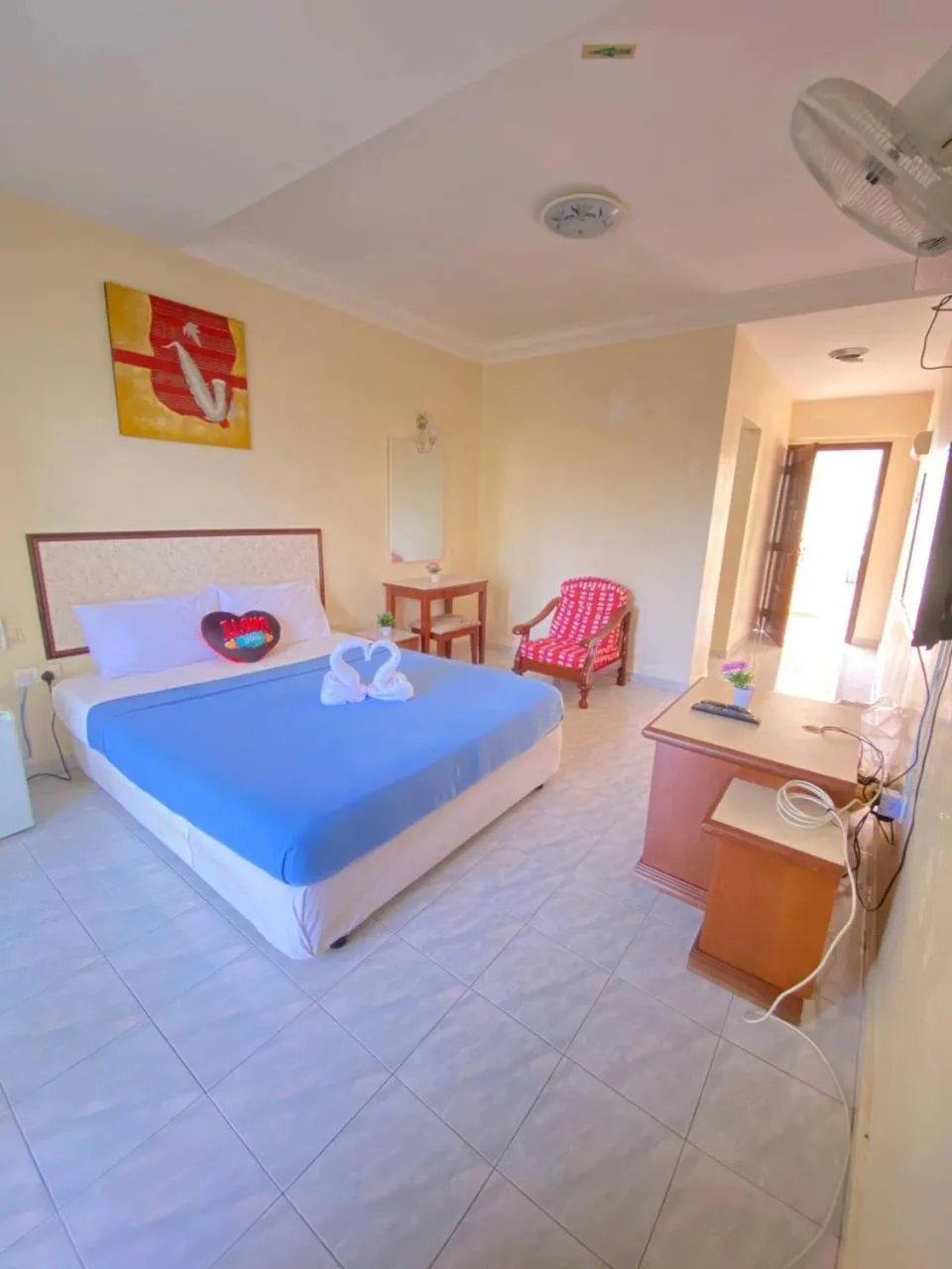 Bed in Teluk Batik Holiday Apartment