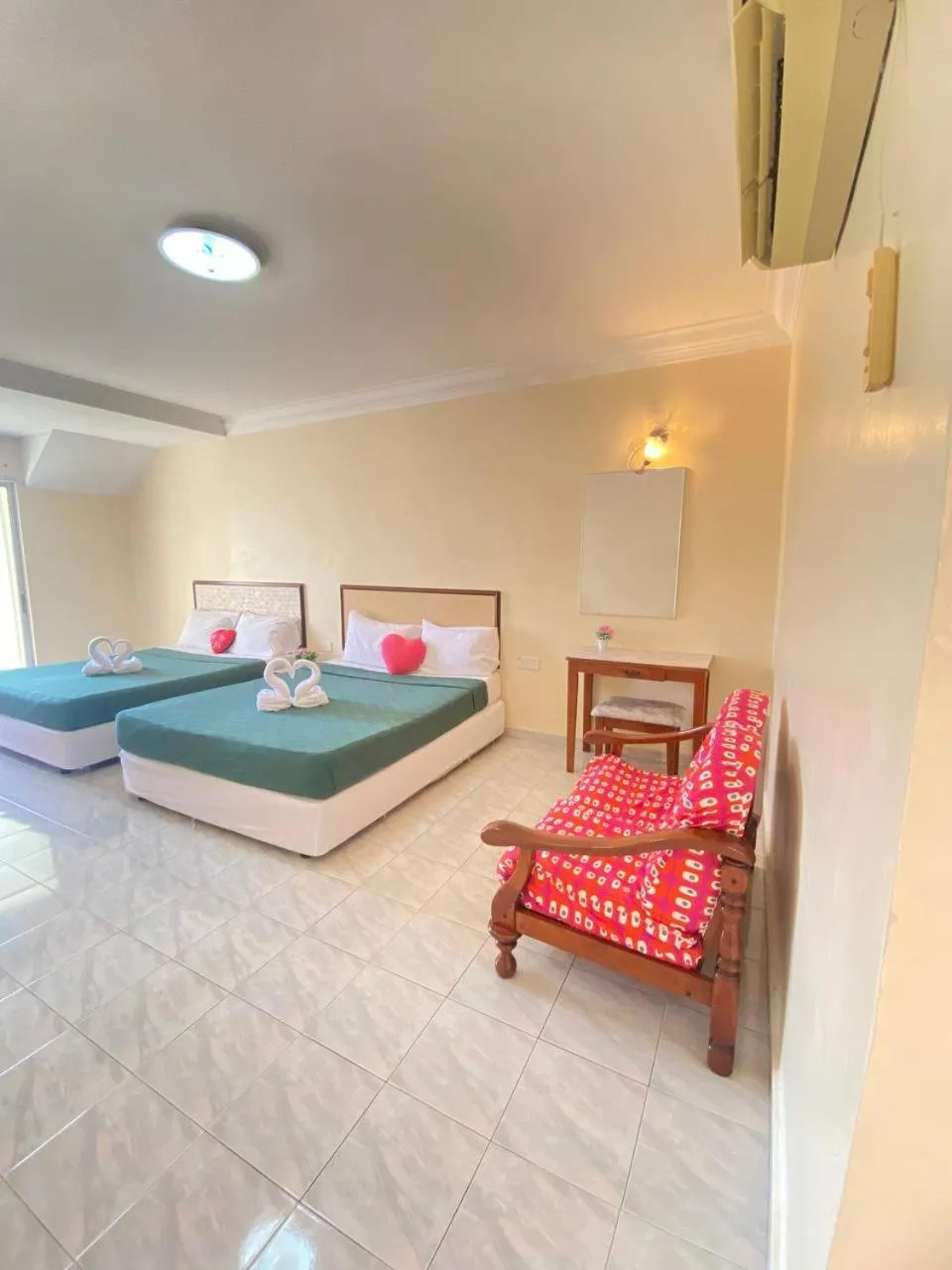 Seating area, Bed in Teluk Batik Holiday Apartment