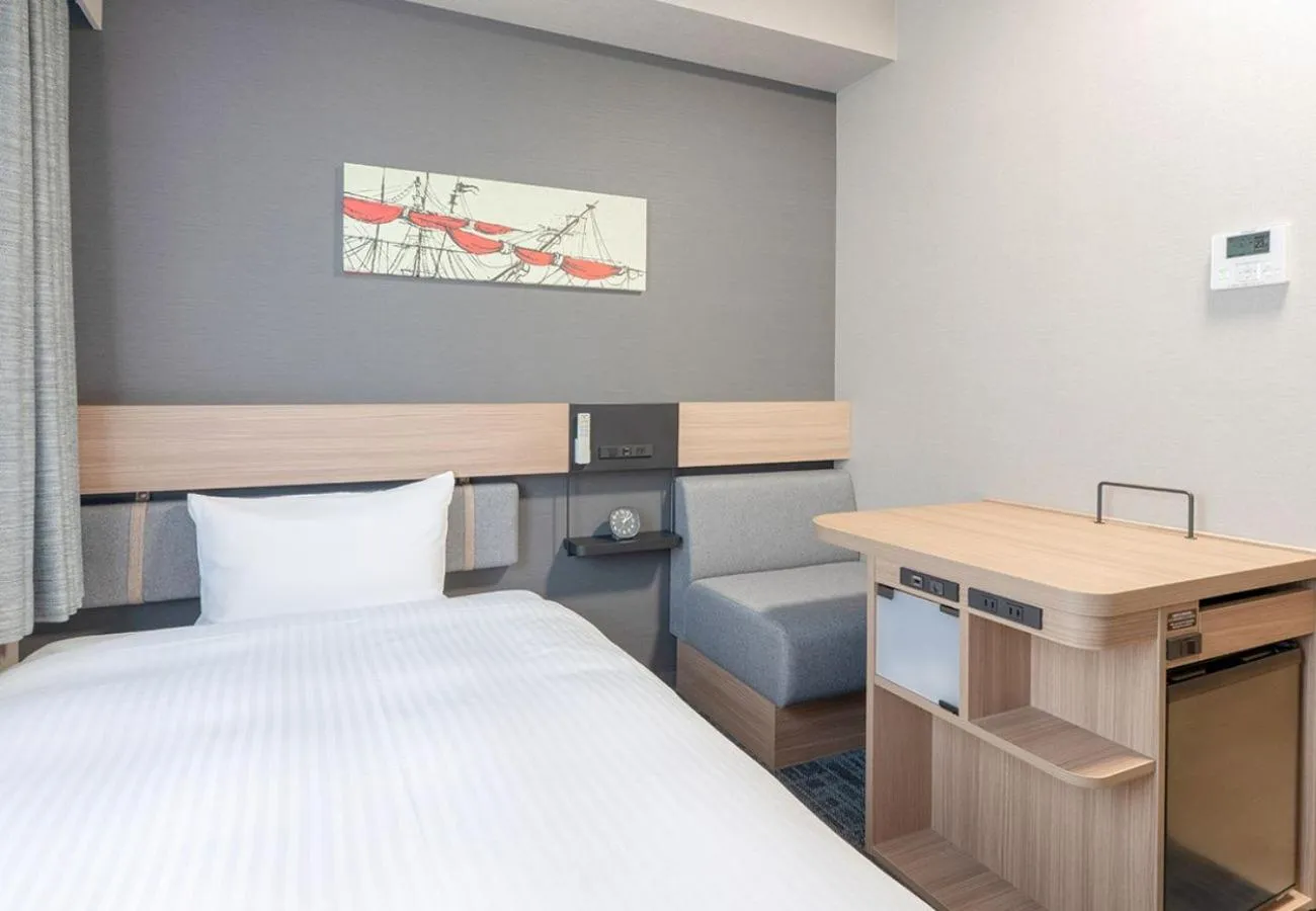 Bed in Washington R&B Hotel Shin Yokohama Ekimae