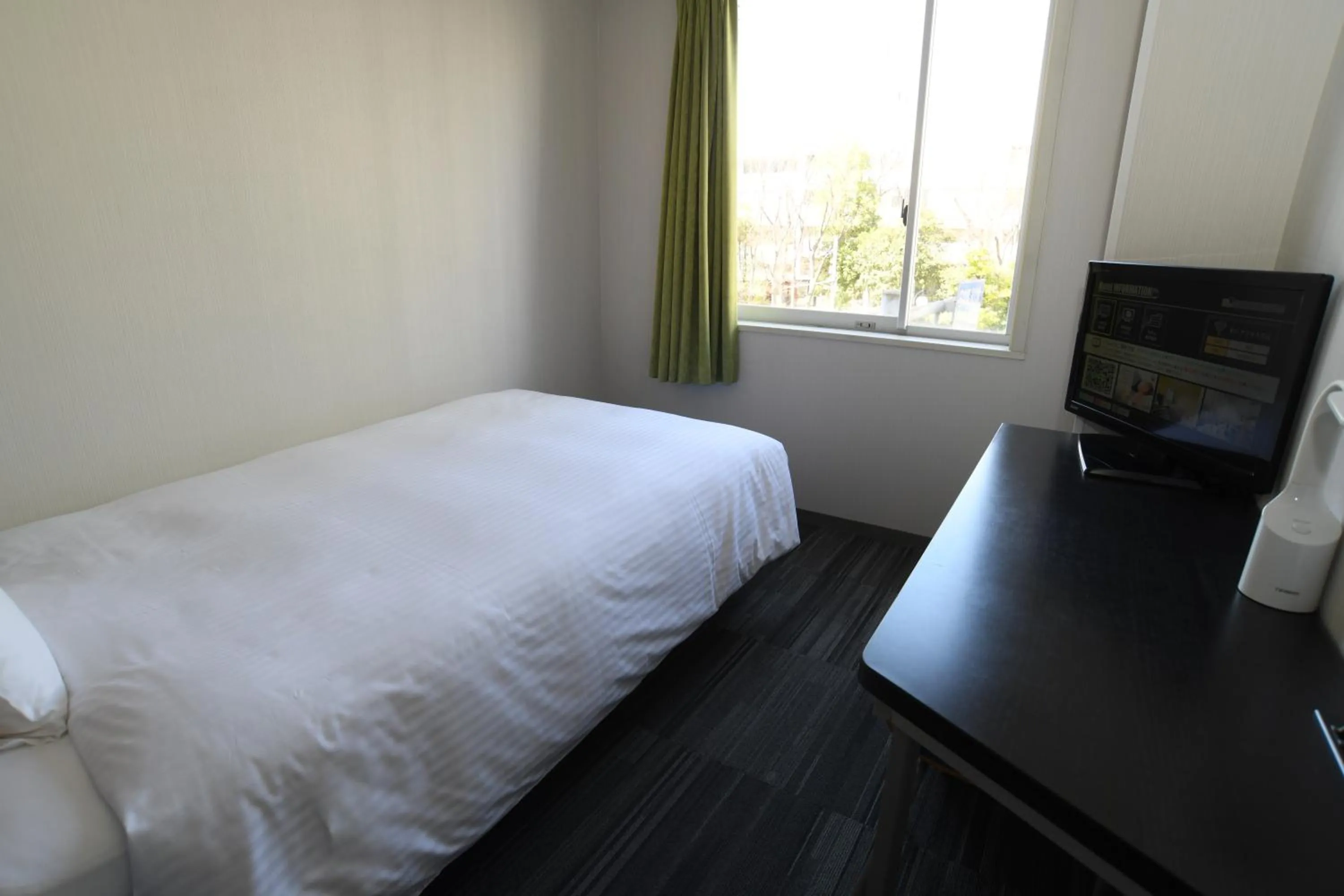 Photo of the whole room, Bed in R&B Hotel Tokyo Toyocho