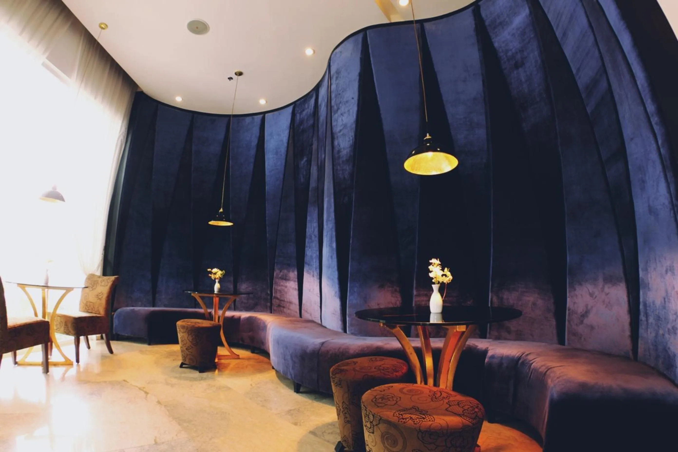 Communal lounge/ TV room in The Penthouse Hotel and Residences