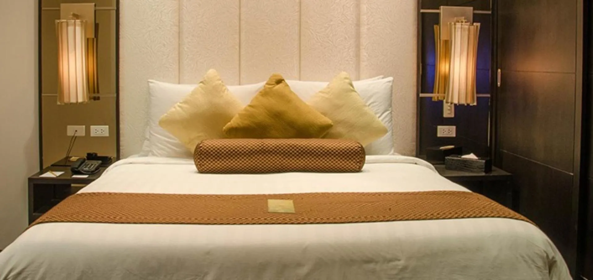 Bed in The Penthouse Hotel and Residences