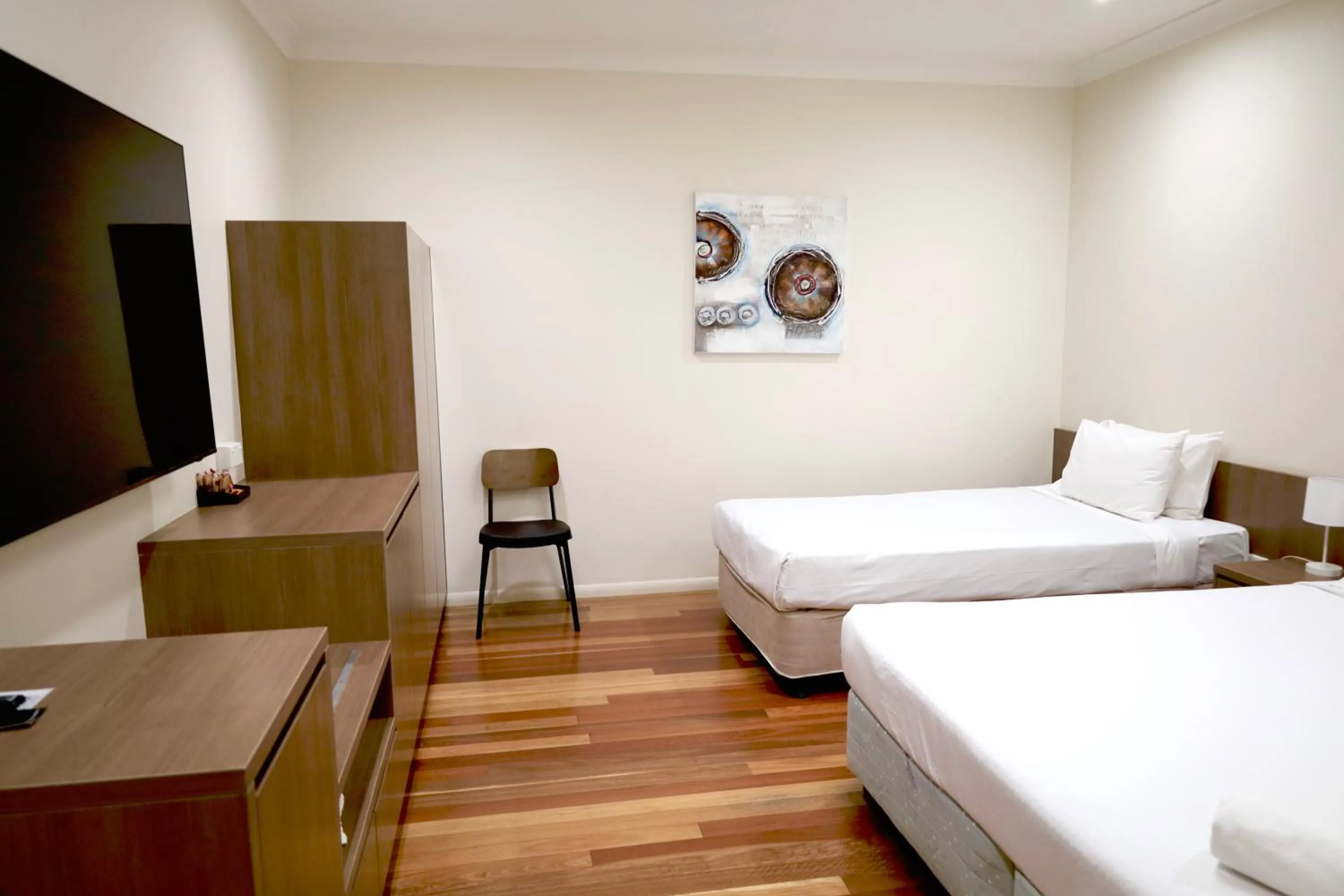 Bed in The Australian Hotel Motel