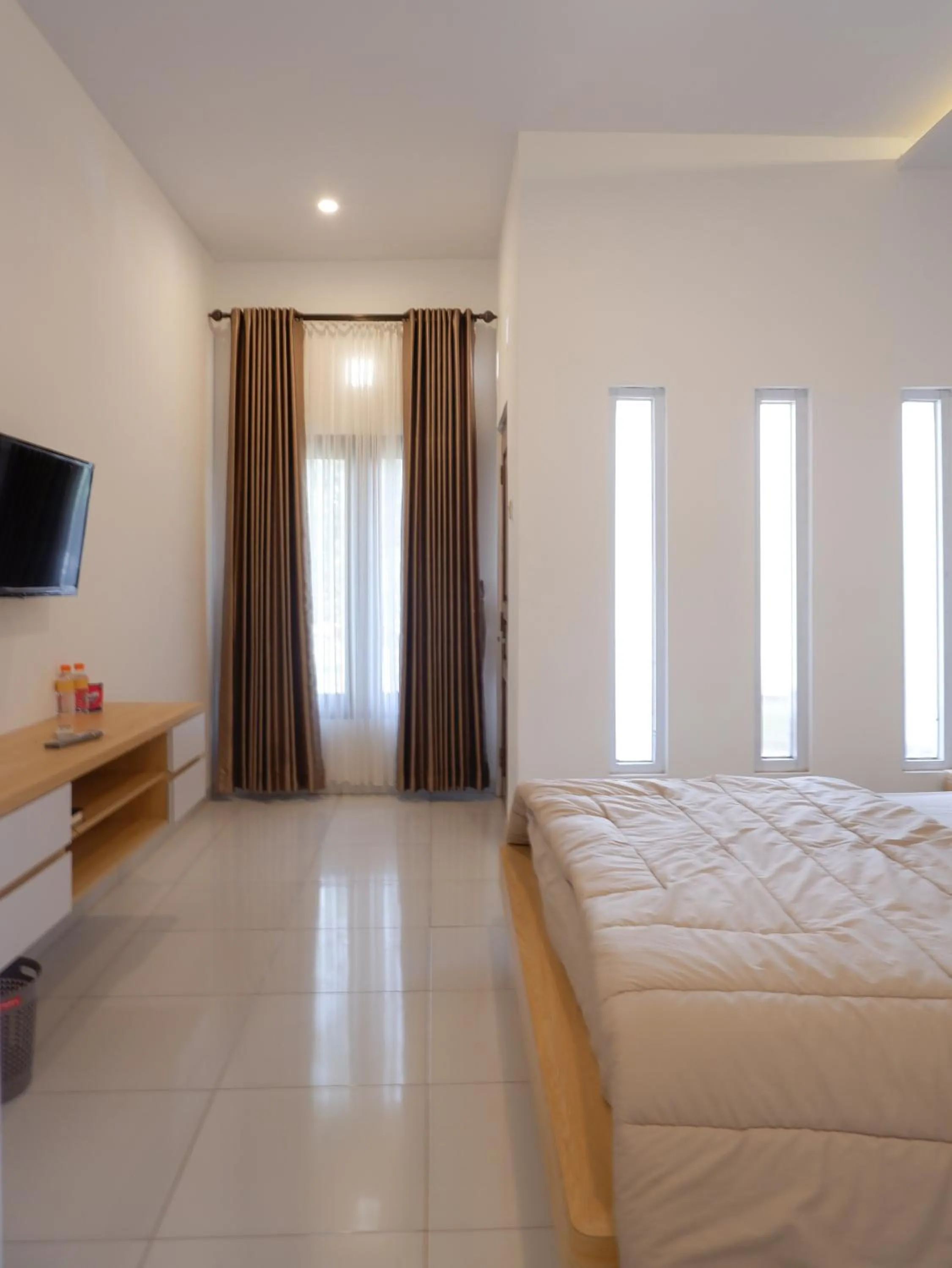 Bed in Homestay Joglo Seruni Syariah