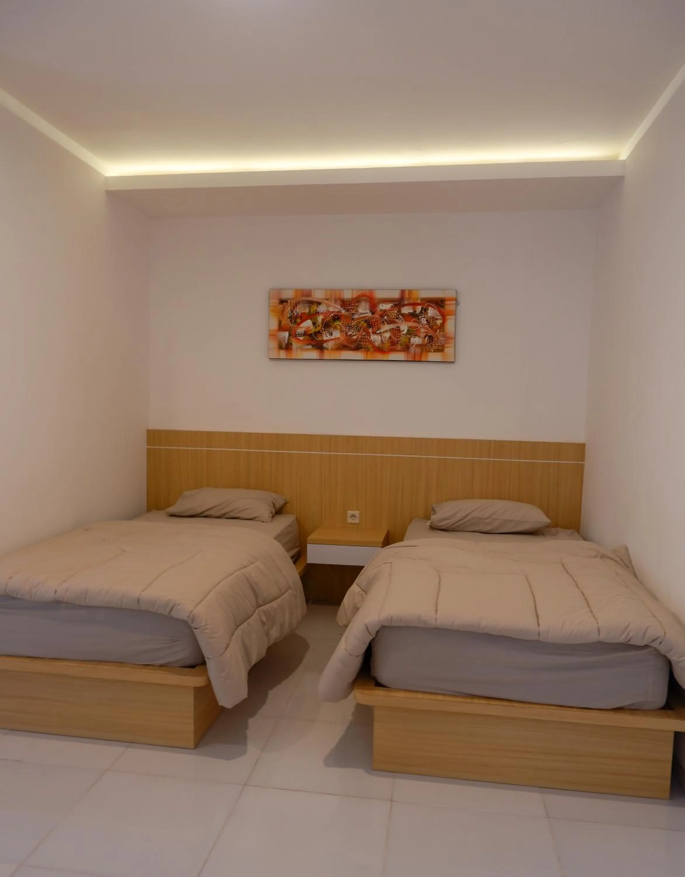 Bed in Homestay Joglo Seruni Syariah