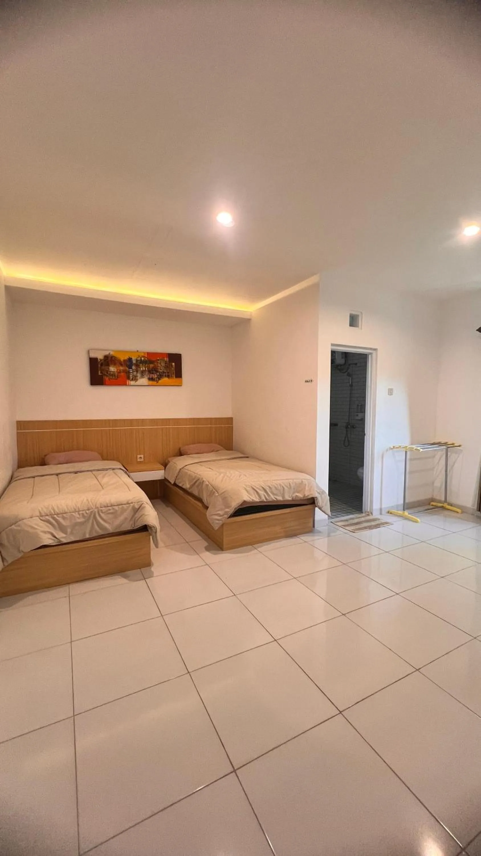 Bed in Homestay Joglo Seruni Syariah