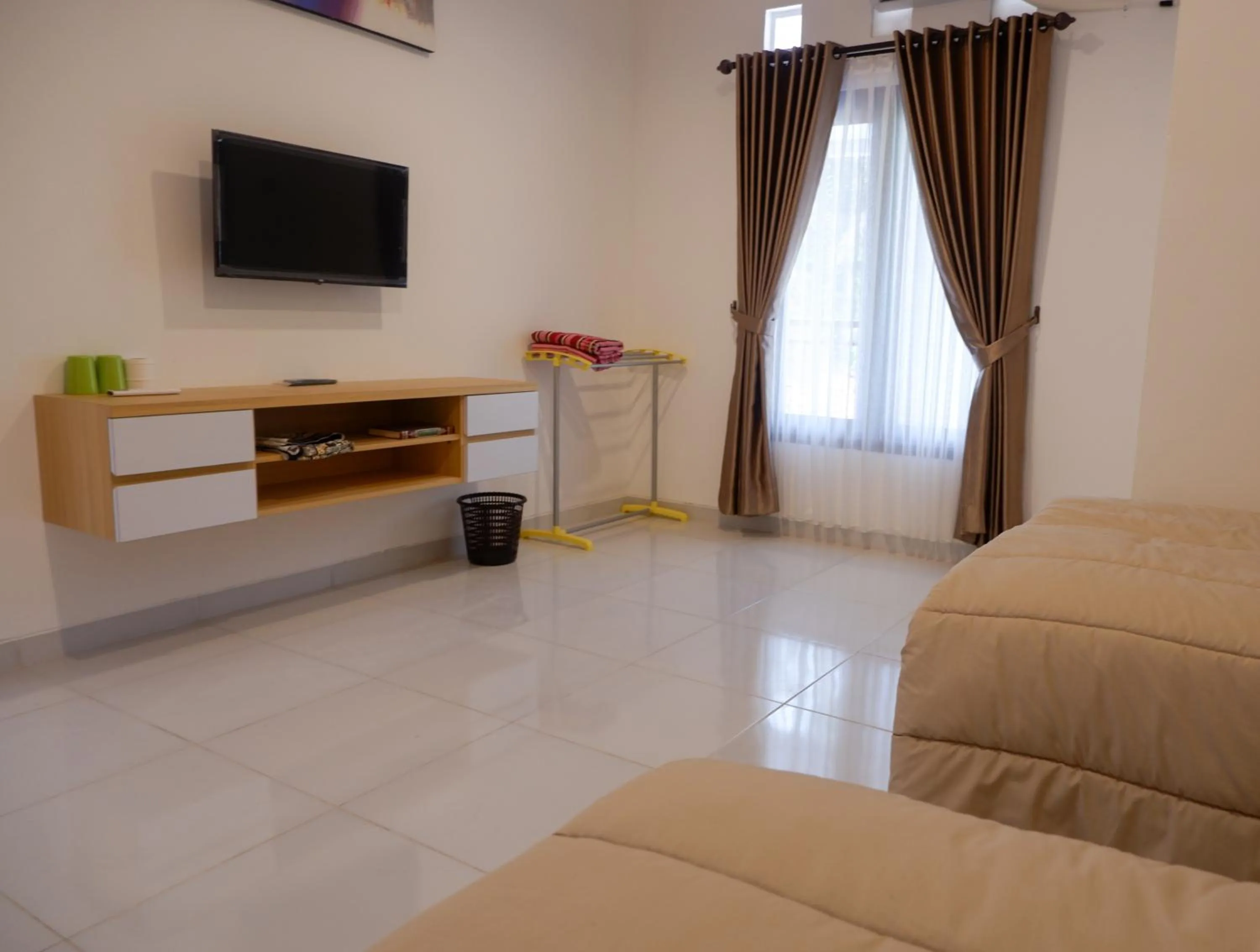 Bed in Homestay Joglo Seruni Syariah