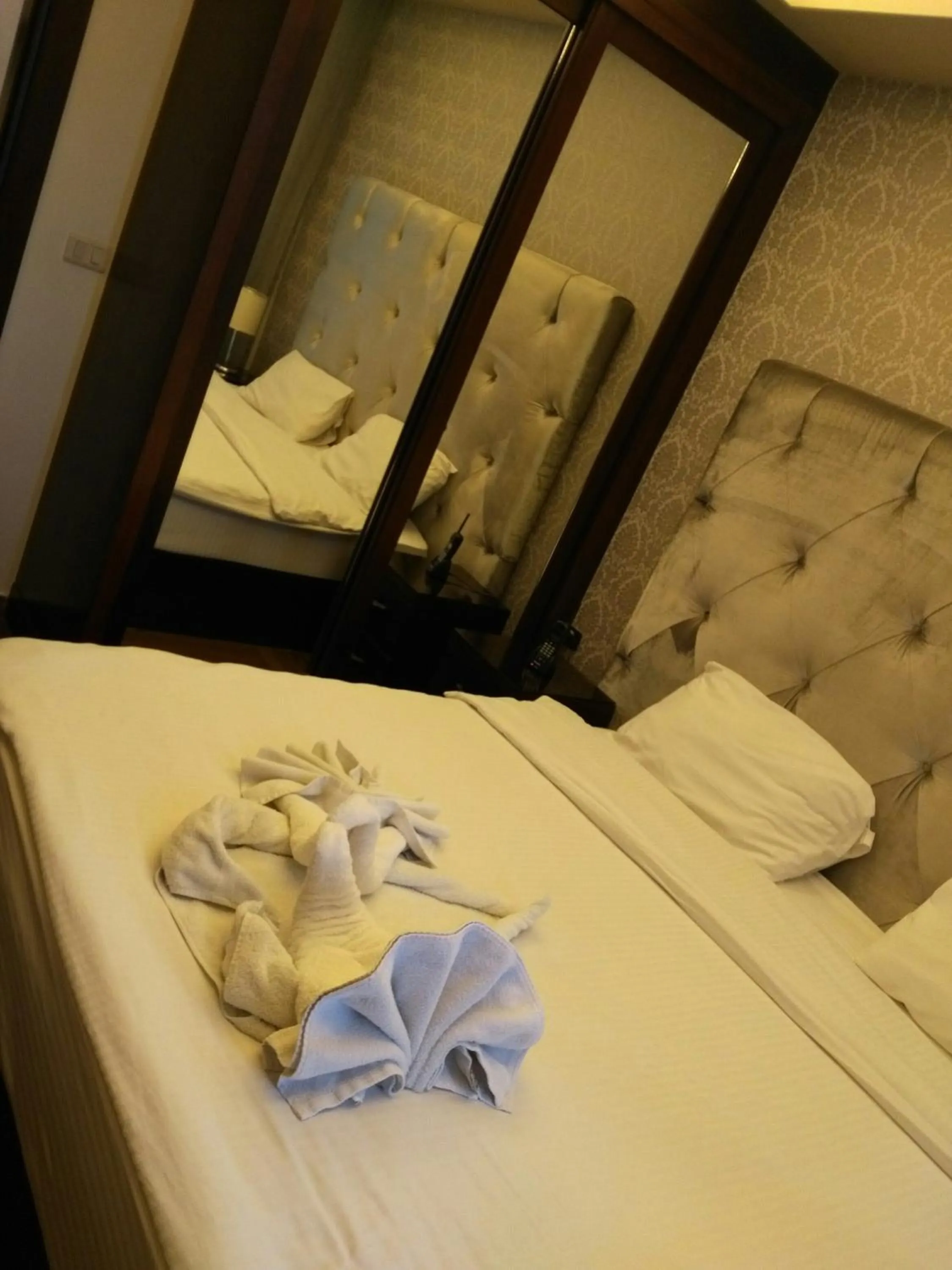 Bedroom, Bed in Nadine Hotel Suites