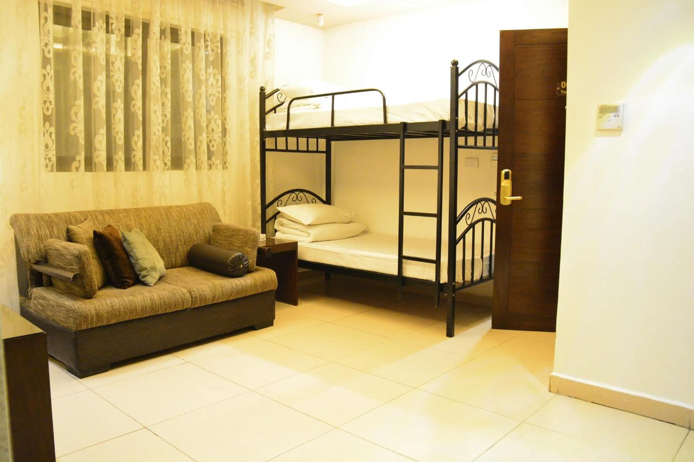 TV and multimedia, Bed in Nadine Hotel Suites