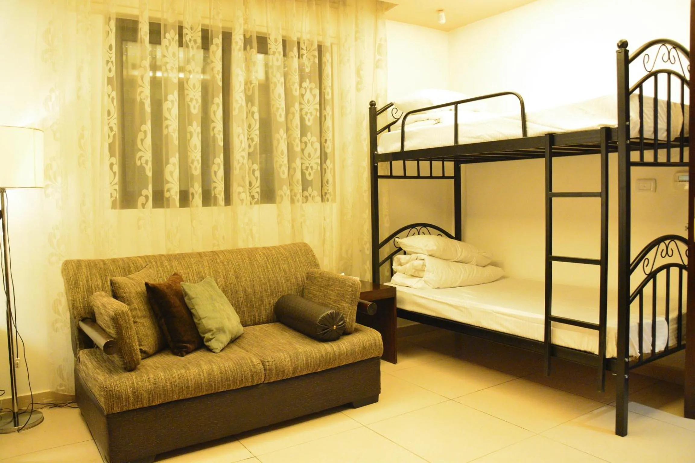 TV and multimedia, Bed in Nadine Hotel Suites