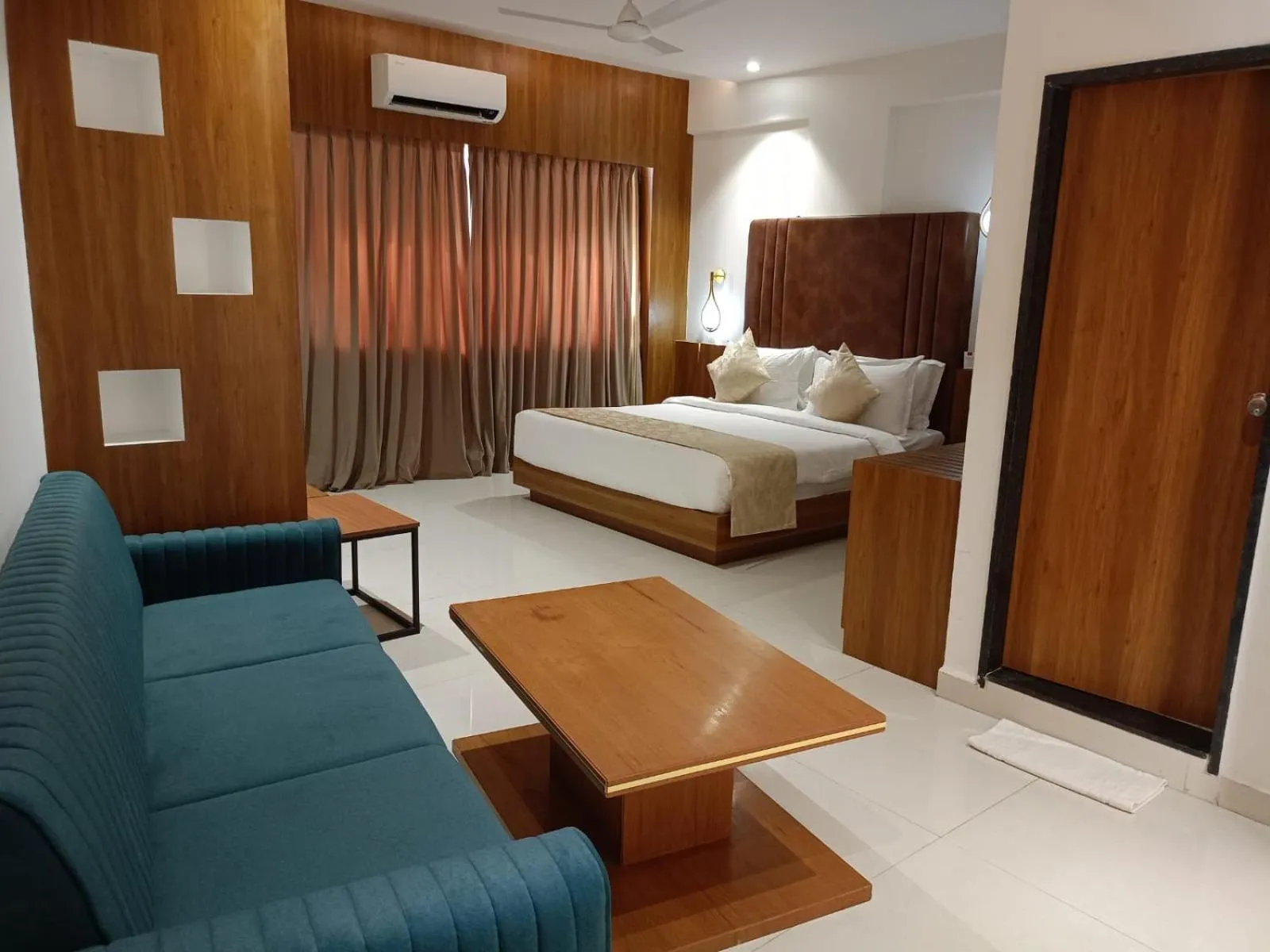 Seating area, Bed in Lords Eco Inn, Ambaji