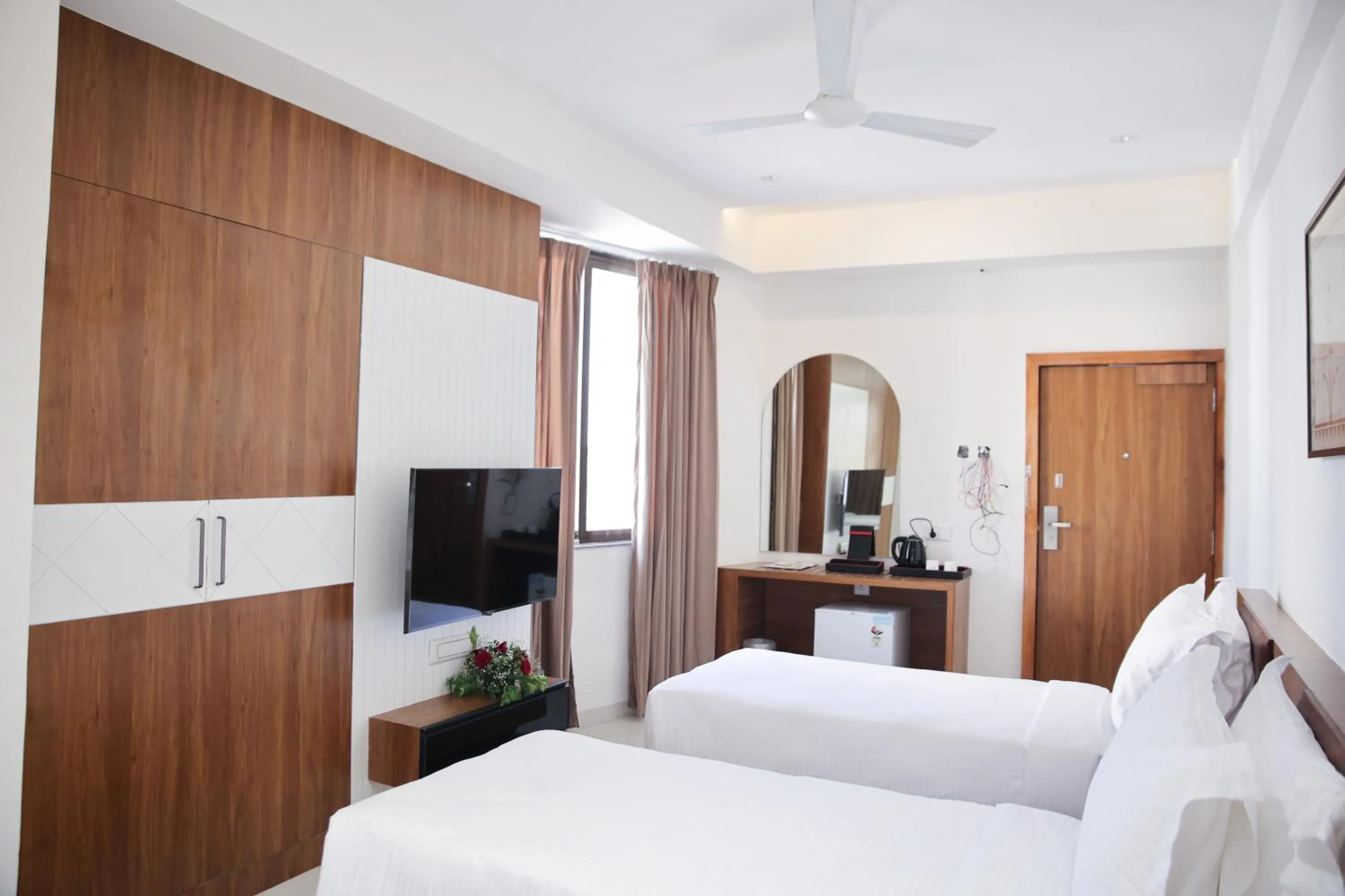 Bed in Lords Eco Inn, Ambaji