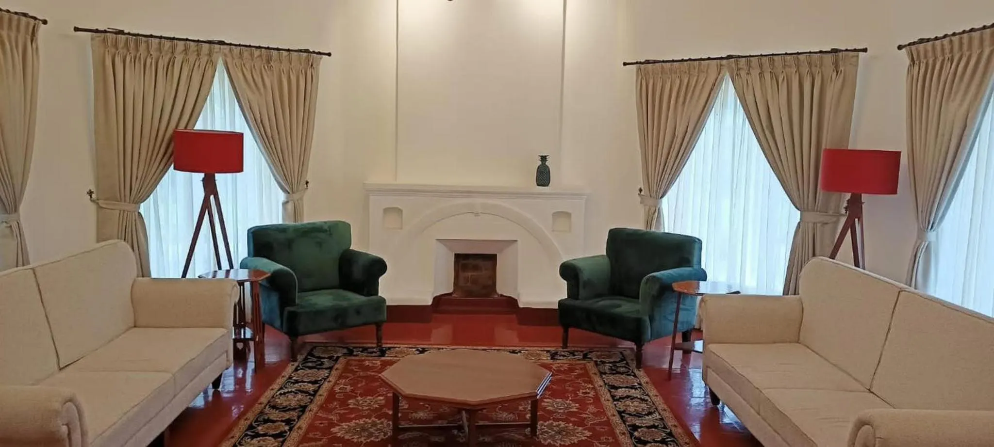 Living room in Lockhart Bungalow Munnar - A CGH Earth SAHA Experience