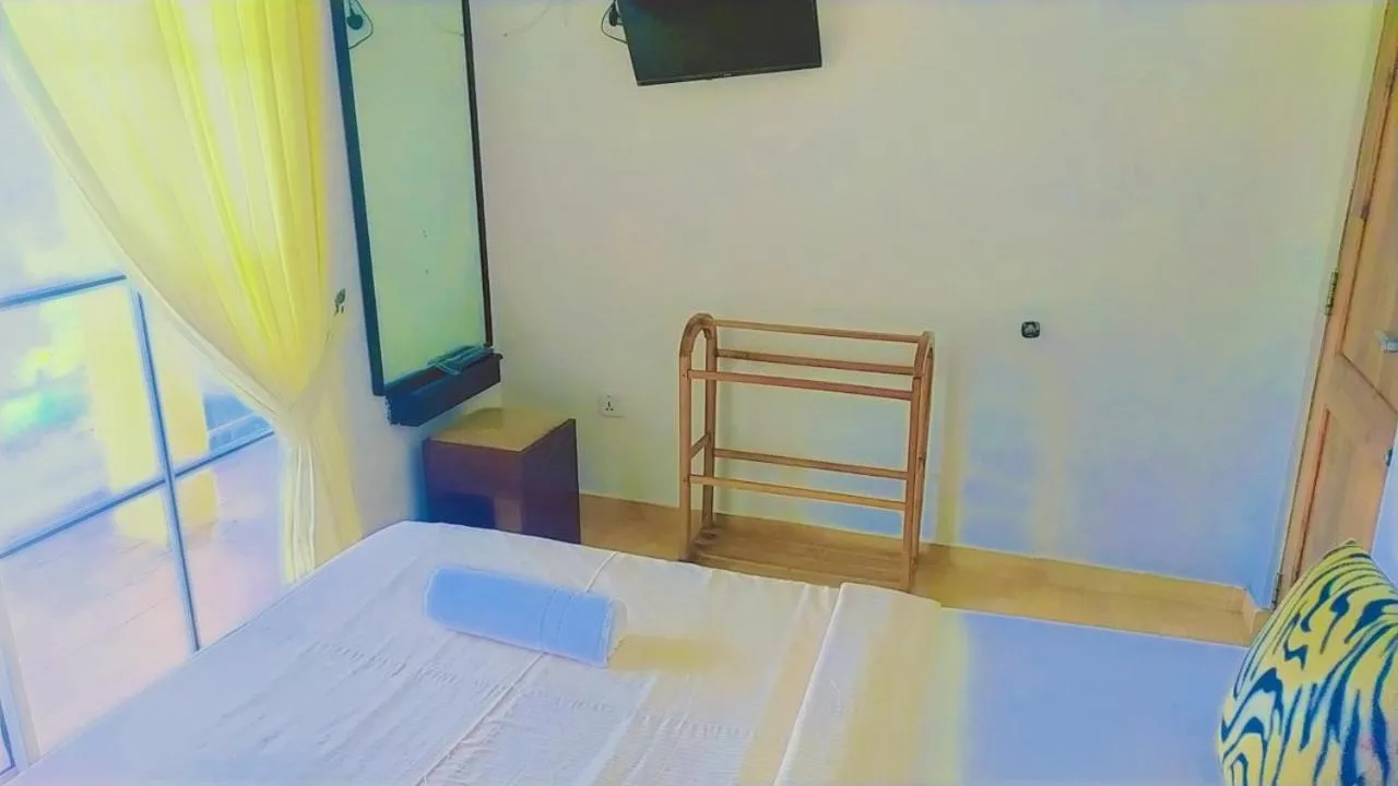 Bedroom, Bed in Lassana Holiday Bungalow