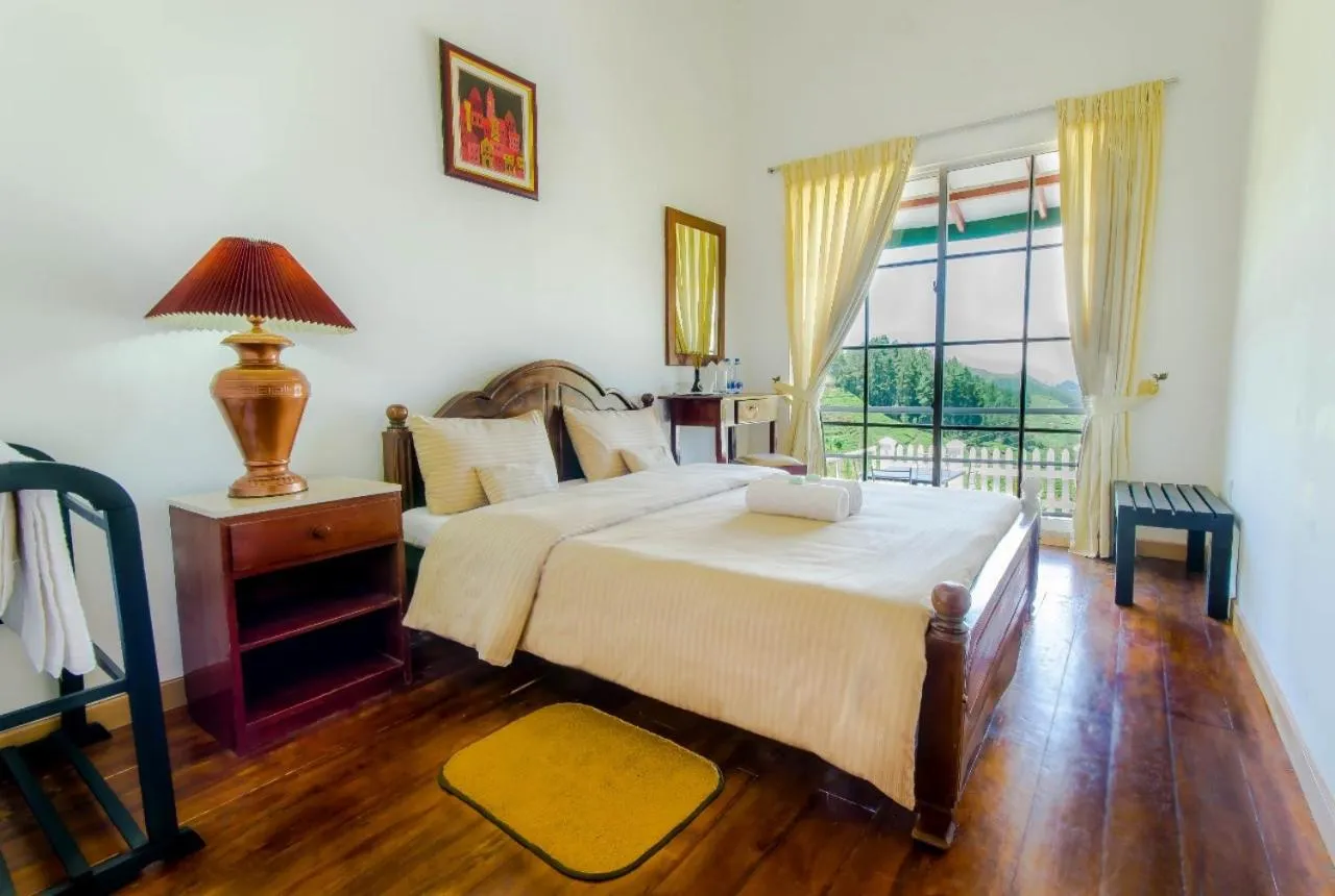 Bed in Lassana Holiday Bungalow