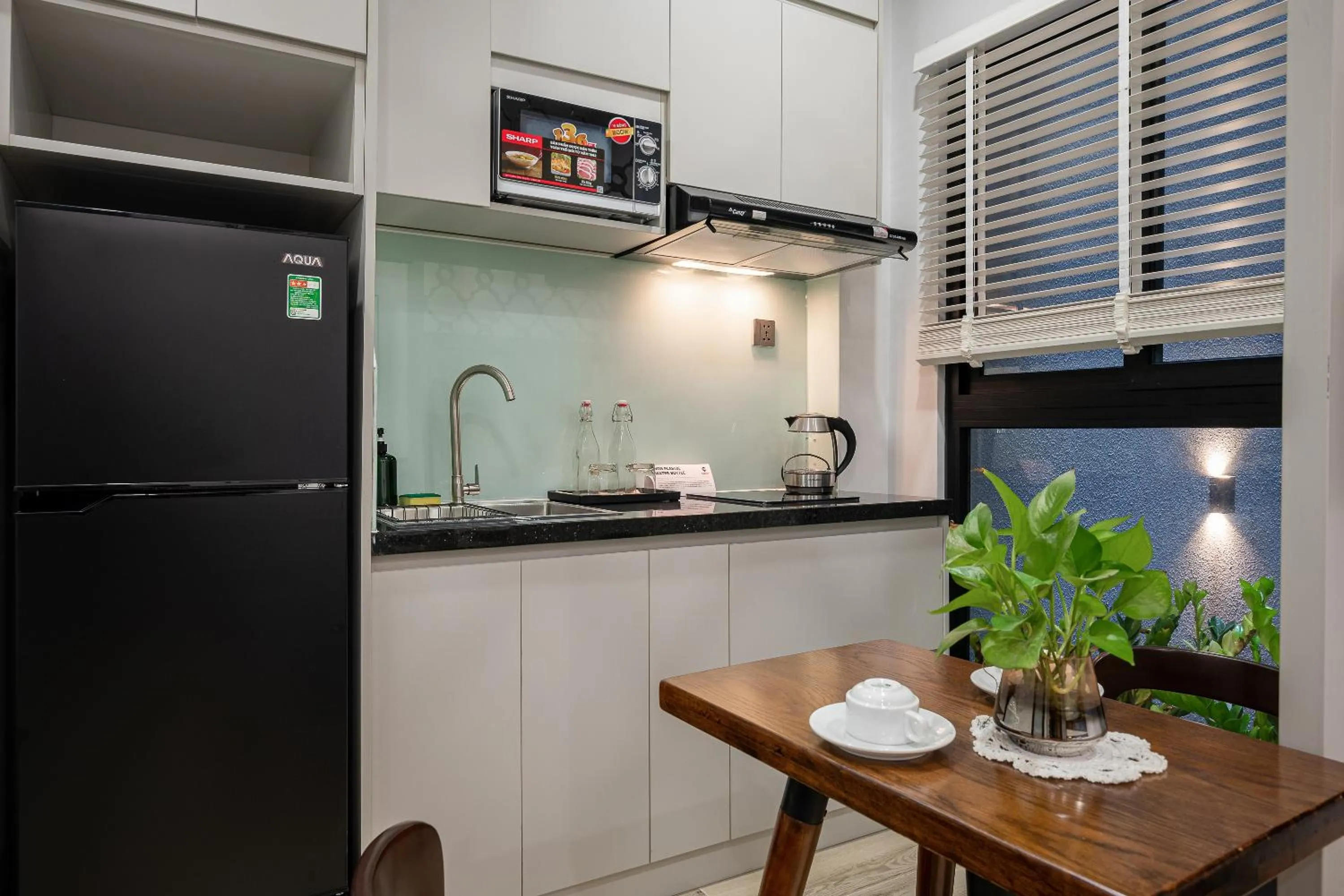 Kitchen or kitchenette in Cozrum Homes - Kena House