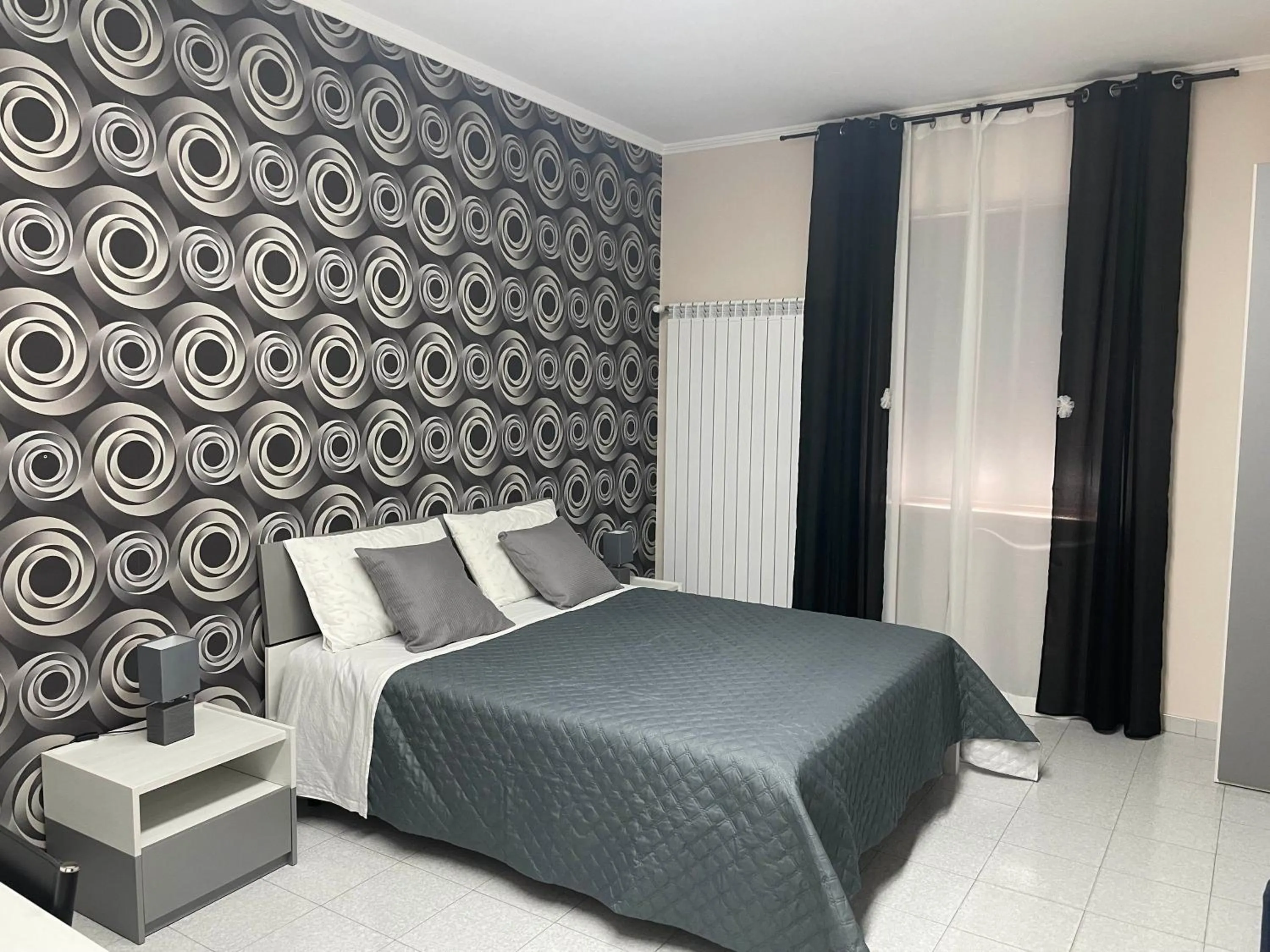 Bed in Gianturco Bed and Breakfast