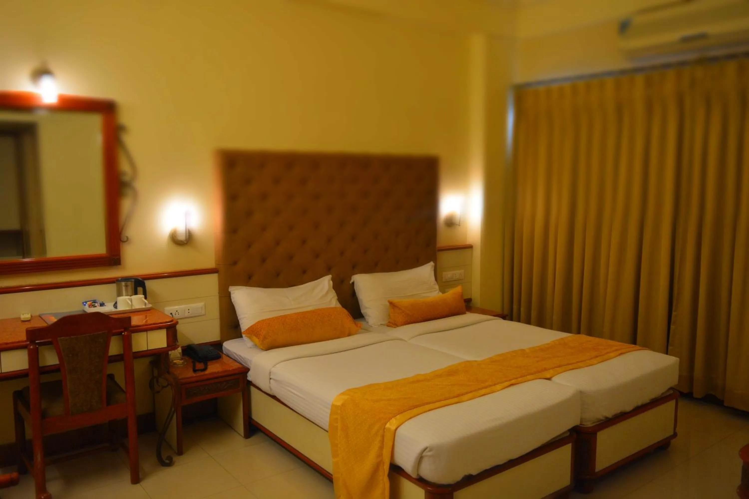 Bed in Hotel Shree Panchratna Pune