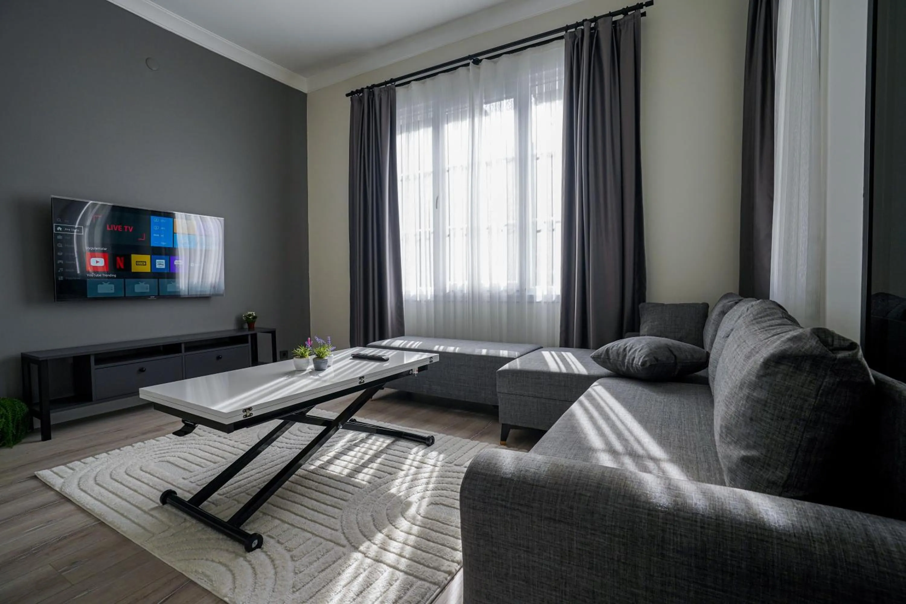 Living room, Bed in Merkuri apartments